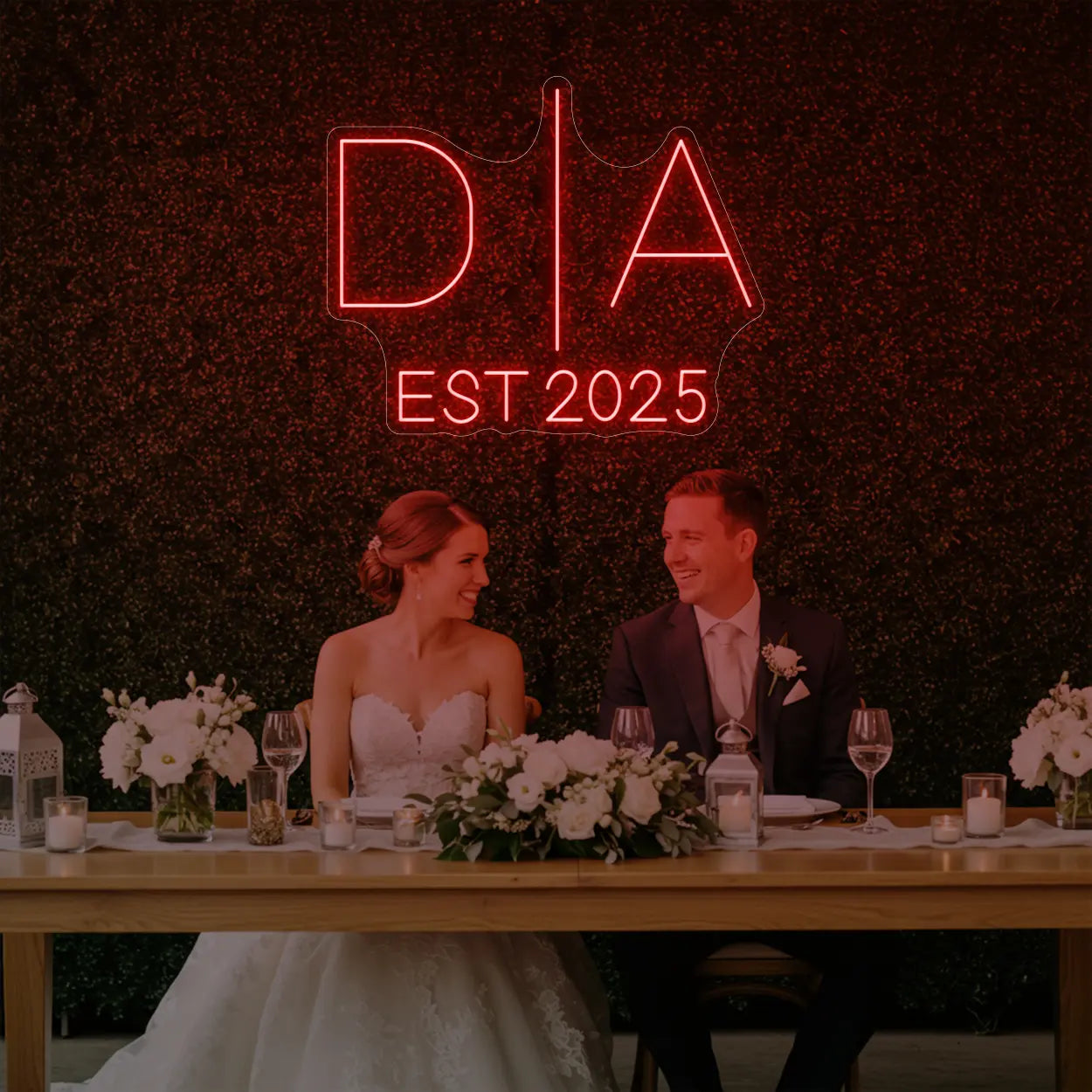 Photo of the 'Wedding Initials Custom Neon Sign V3' neon sign glowing in red against a styled interior wall.