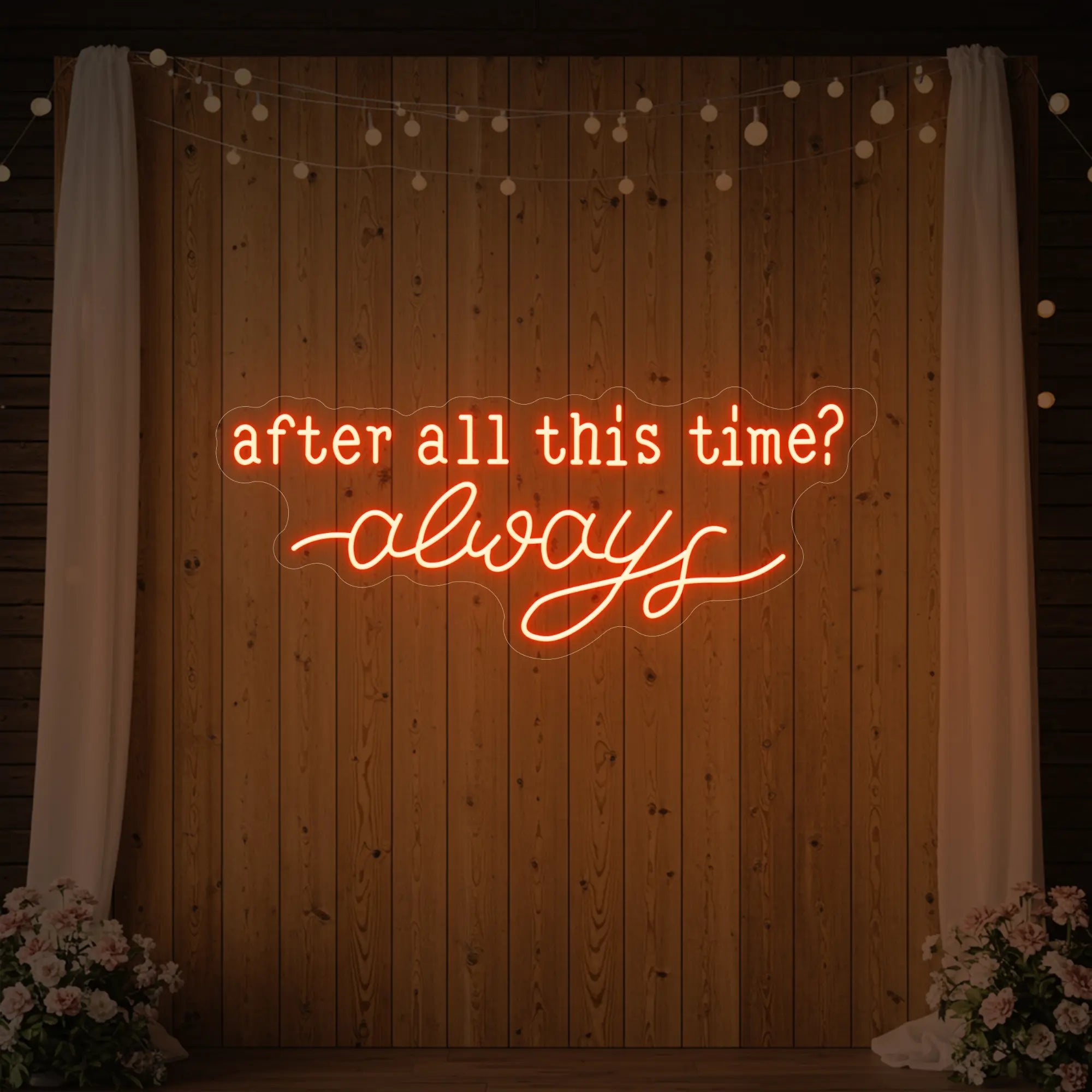 Photo of the 'After All This Time V1' neon sign glowing in golden yellow against a styled interior wall.