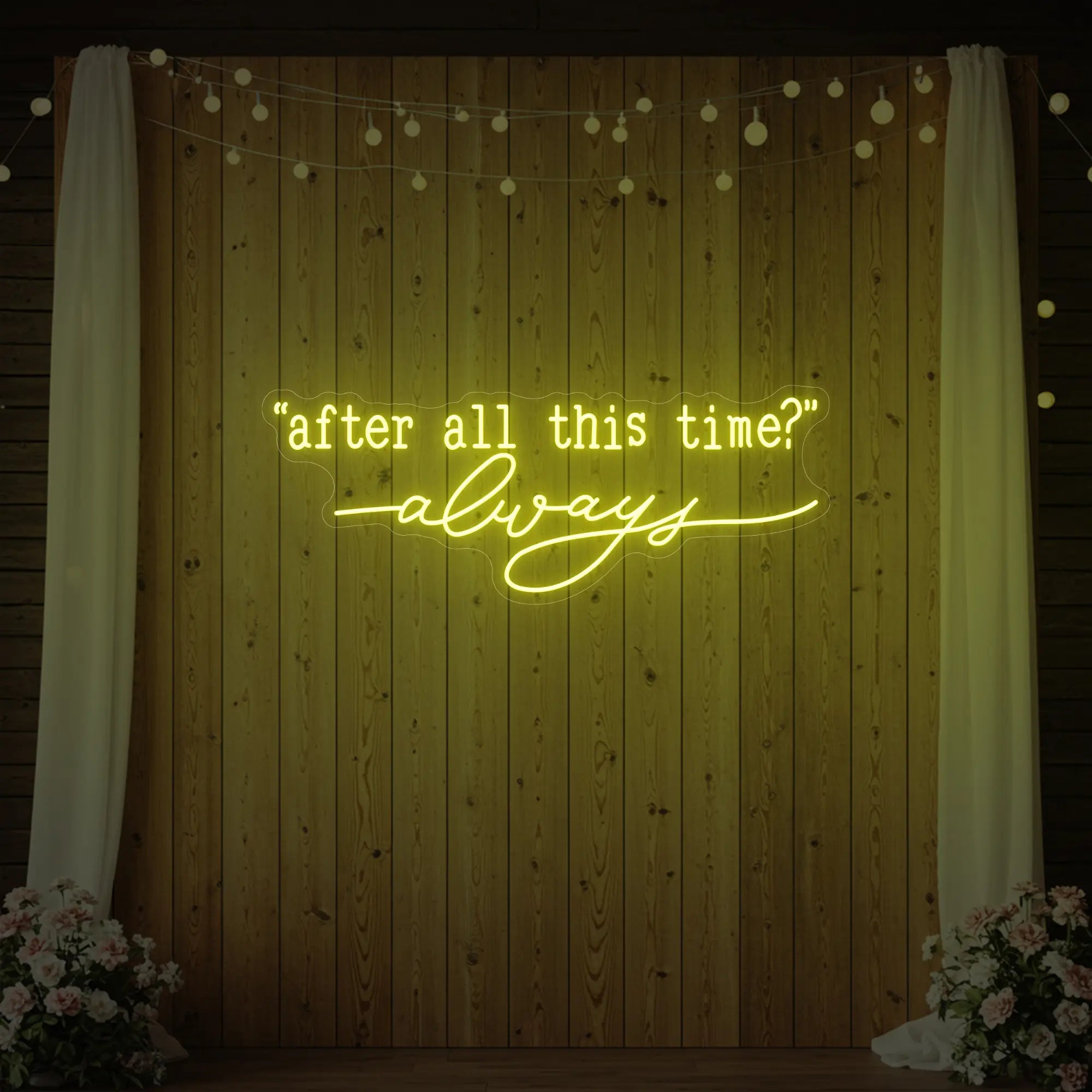 Photo of the 'After All This Time V2' neon sign glowing in lemon yellow against a styled interior wall.