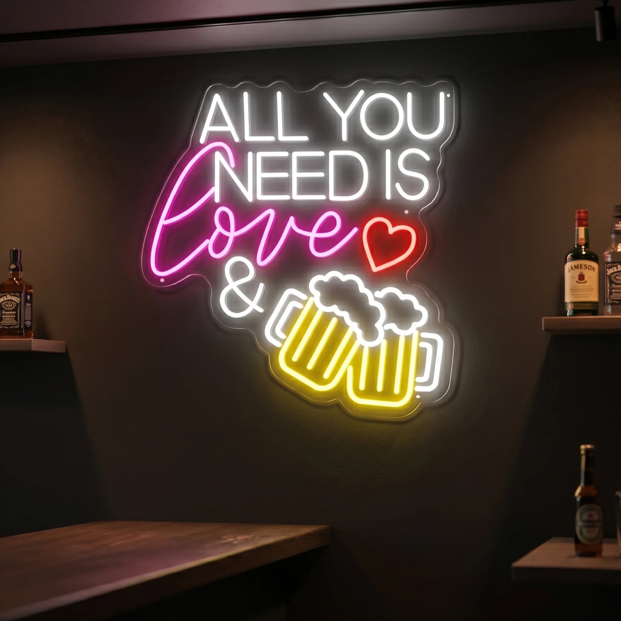 Photo of the 'ALL YOU NEED IS LOVE & BEER' neon sign glowing in cool white against a styled interior wall.