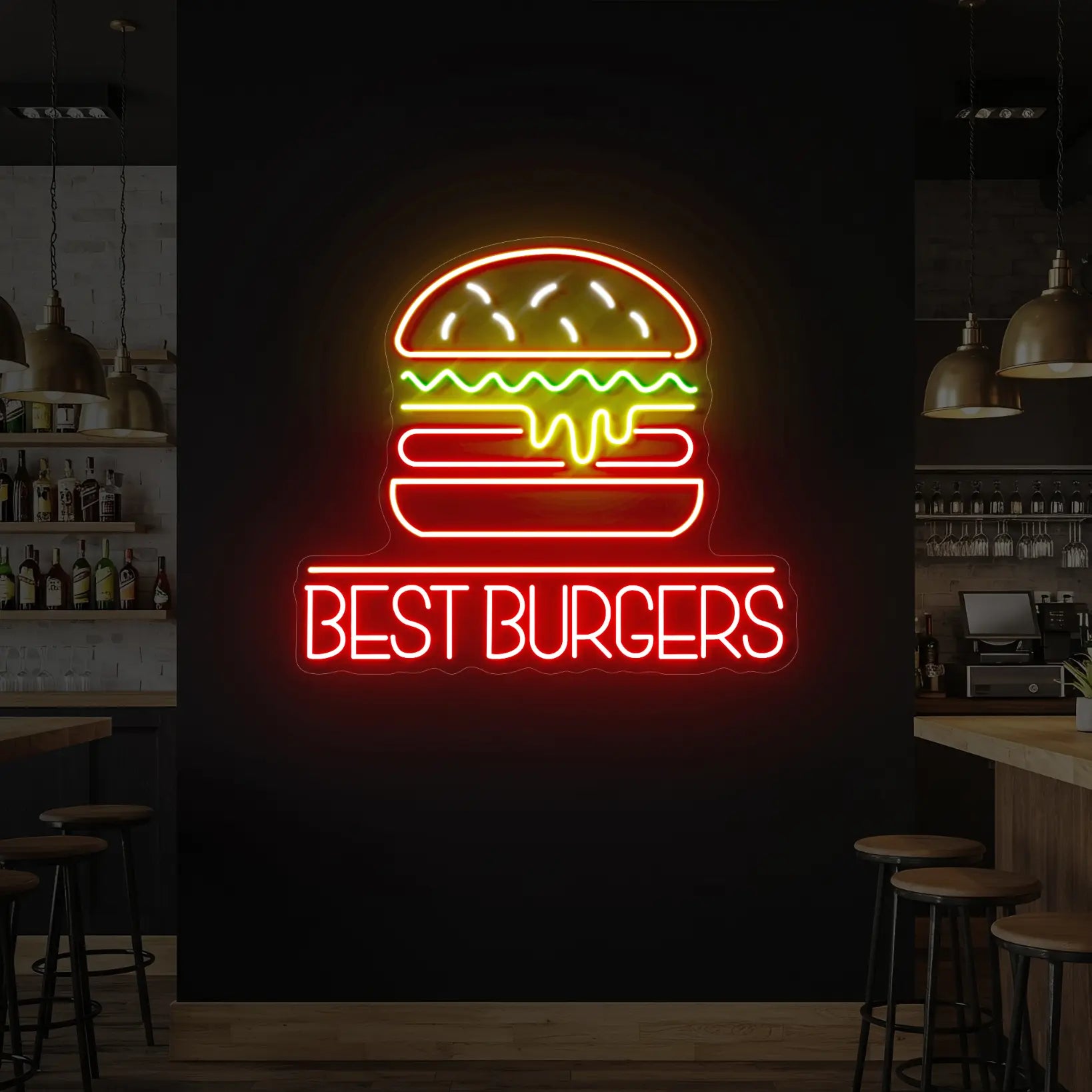 Photo of the 'Best Burgers' neon sign glowing in red, yellow and green against a styled interior wall.
