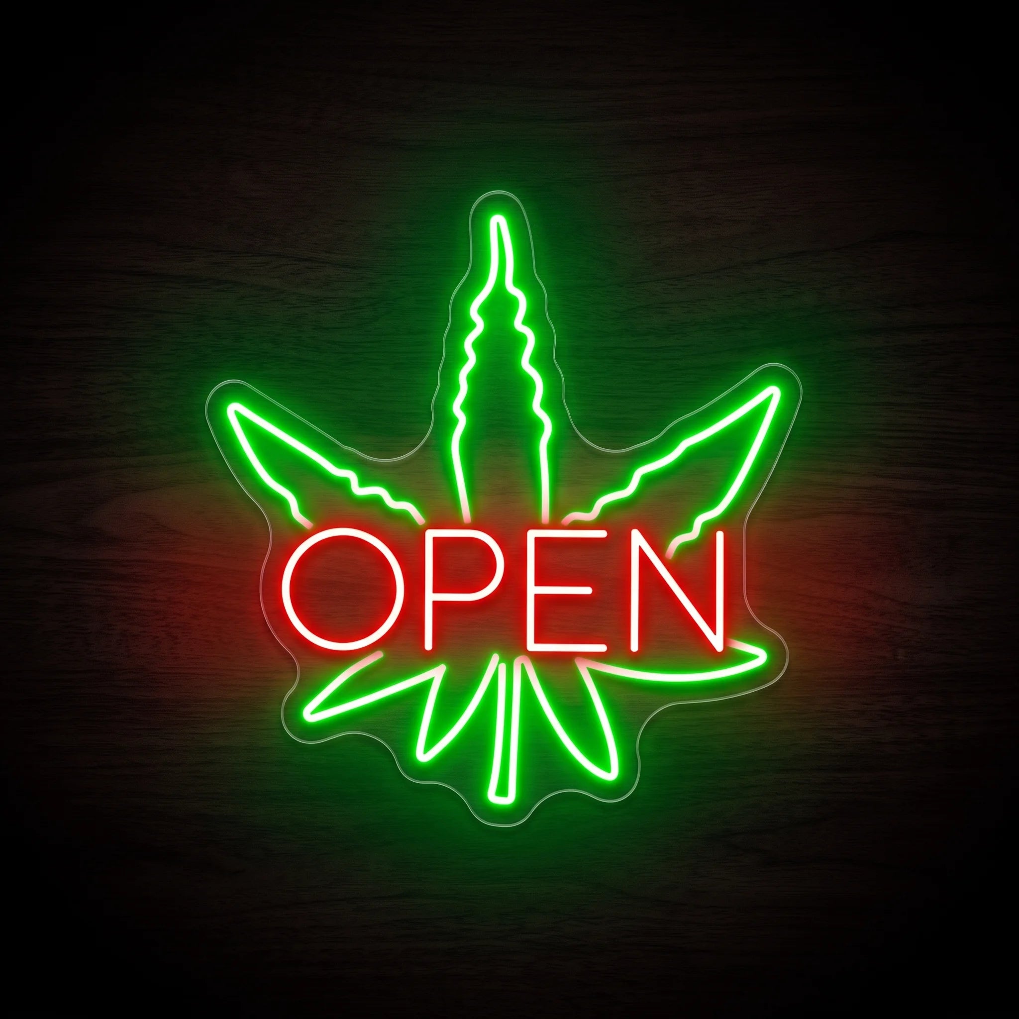 Green cannabis leaf OPEN LED neon sign with red lettering on clear acrylic backing for dispensary and recreational retail wall dΓ©cor.