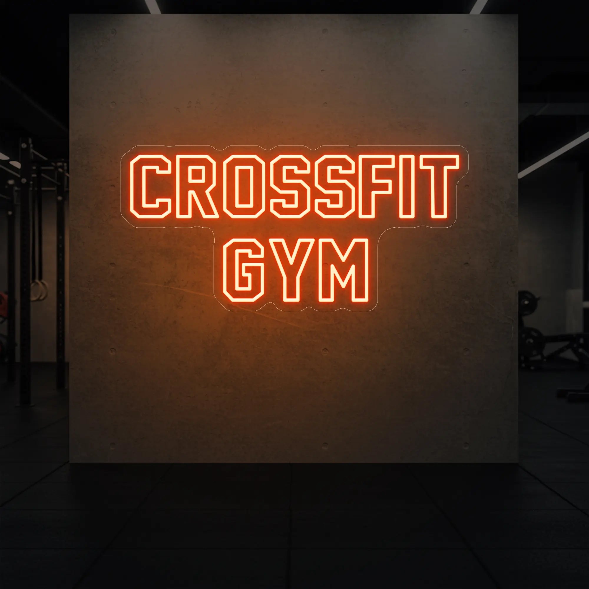 'CrossFit Gym' neon sign glowing in golden yellow against a styled interior wall.