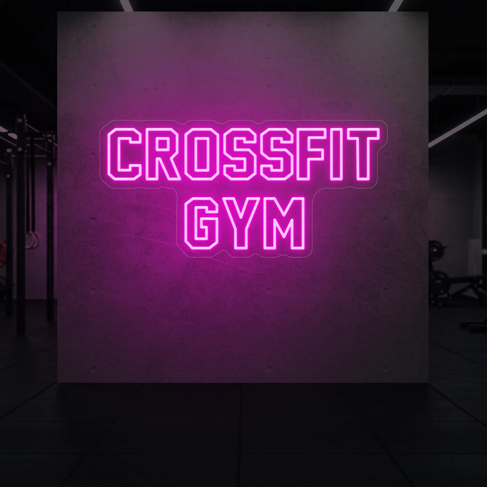 'CrossFit Gym' neon sign glowing in light pink against a styled interior wall.
