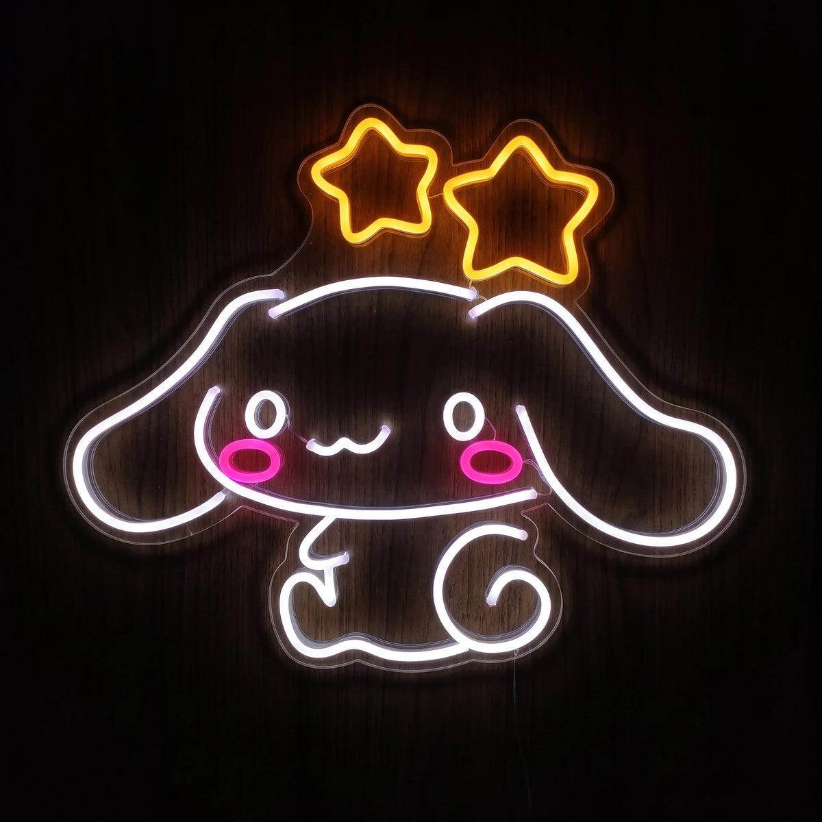 Cute Bunny Stars LED neon sign featuring a white floppy-eared bunny with pink cheeks and two glowing yellow stars on clear acrylic.