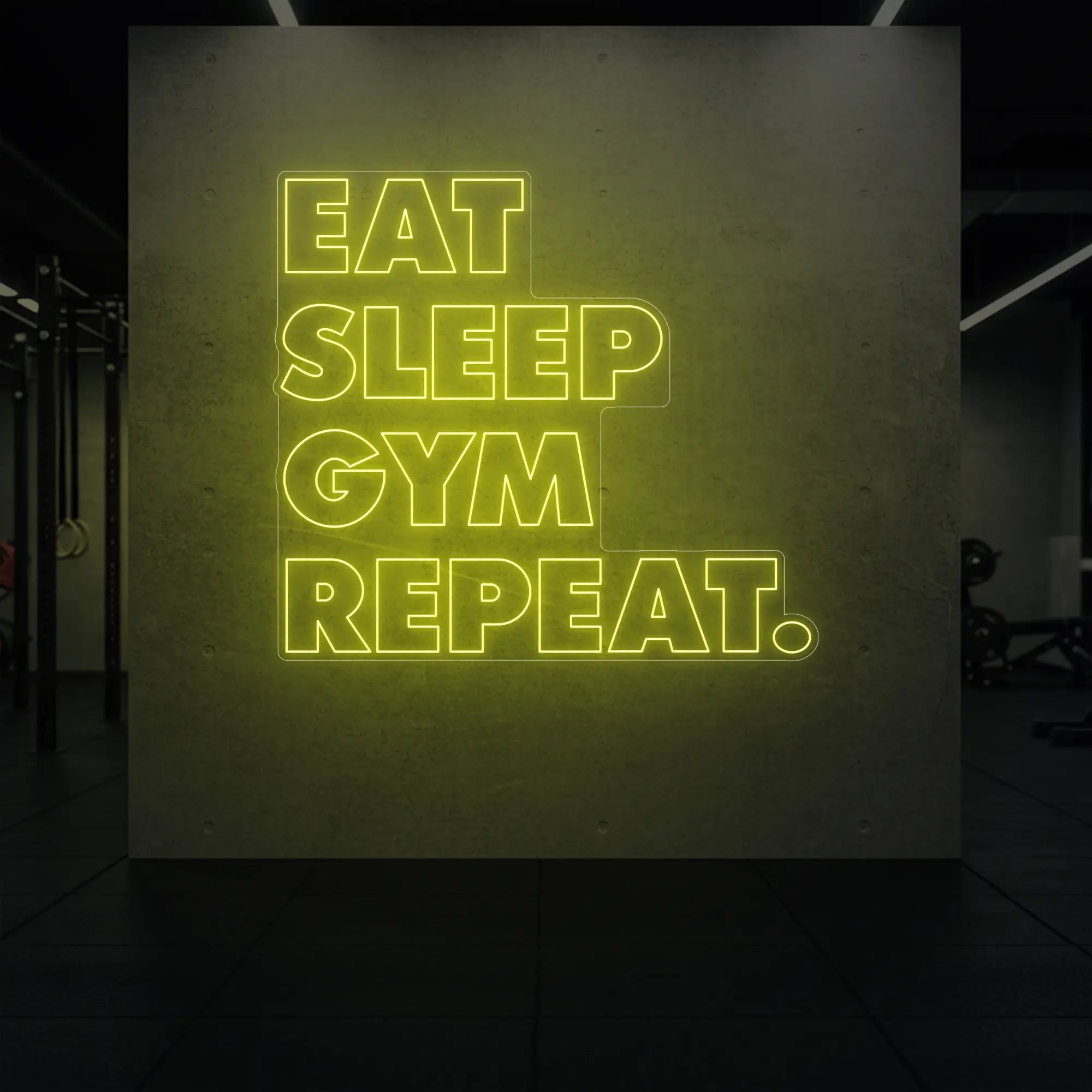 'Eat Sleep Gym Repeat' neon sign glowing in lemon yellow against a styled interior wall.