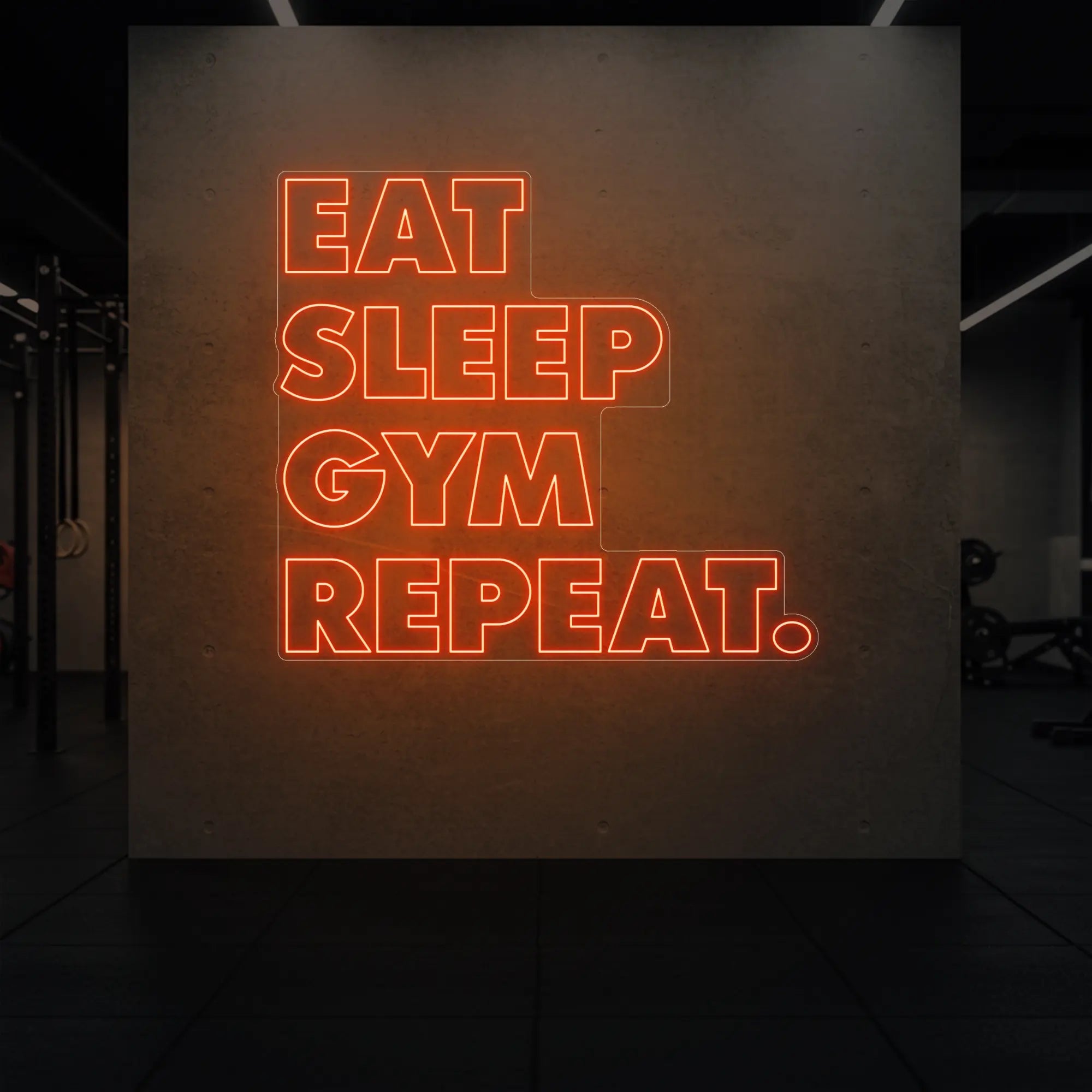 'Eat Sleep Gym Repeat' neon sign glowing in golden yellow against a styled interior wall.