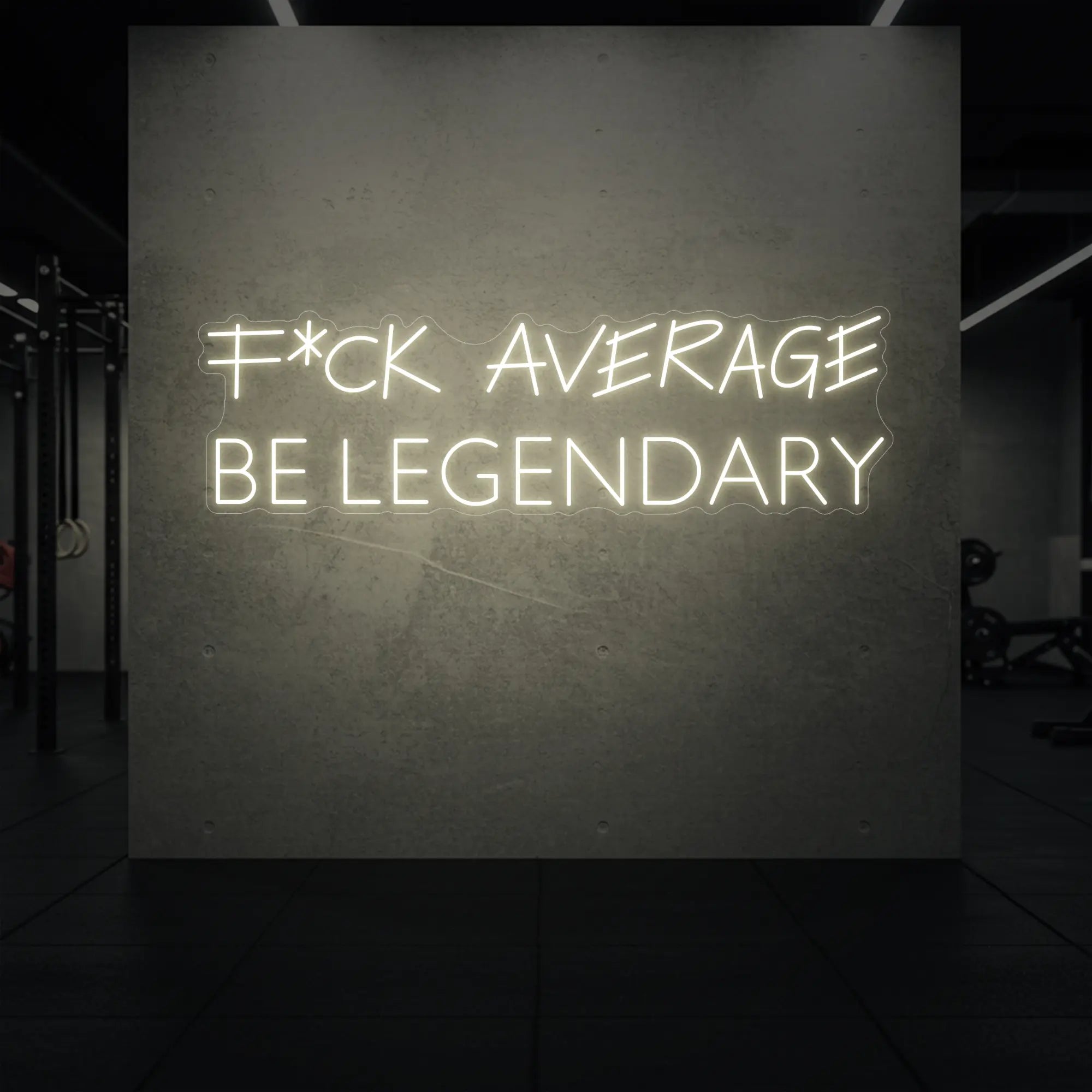 'F*ck Average Be Legendary' neon sign glowing in warm white against a styled interior wall.