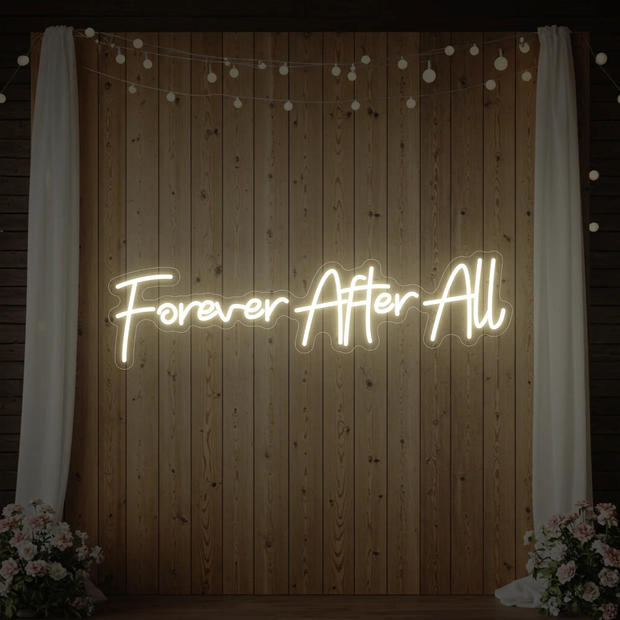 Photo of the 'Forever After All' neon sign glowing in warm white against a styled interior wall.