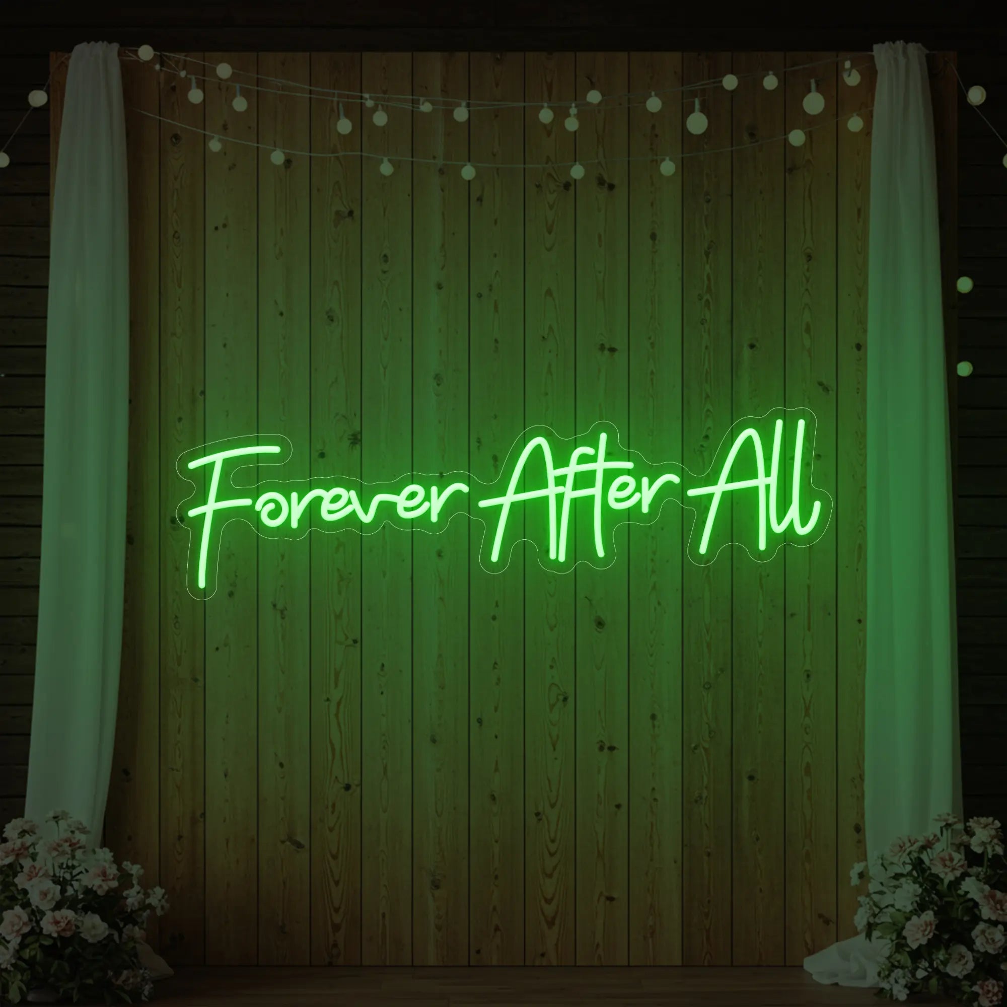 Photo of the 'Forever After All' neon sign glowing in green against a styled interior wall.