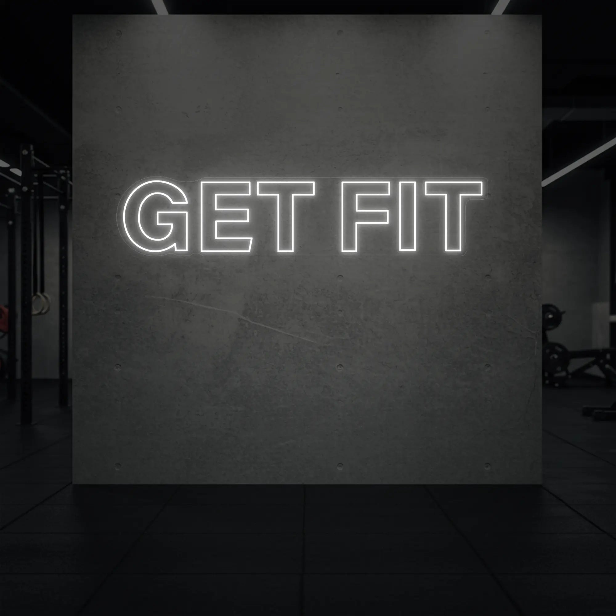 'Get Fit' neon sign glowing in cool white against a styled interior wall.