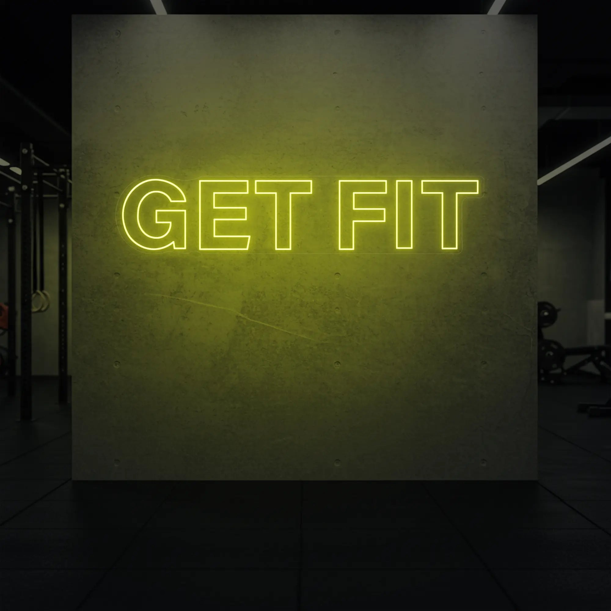 'Get Fit' neon sign glowing in lemon yellow against a styled interior wall.