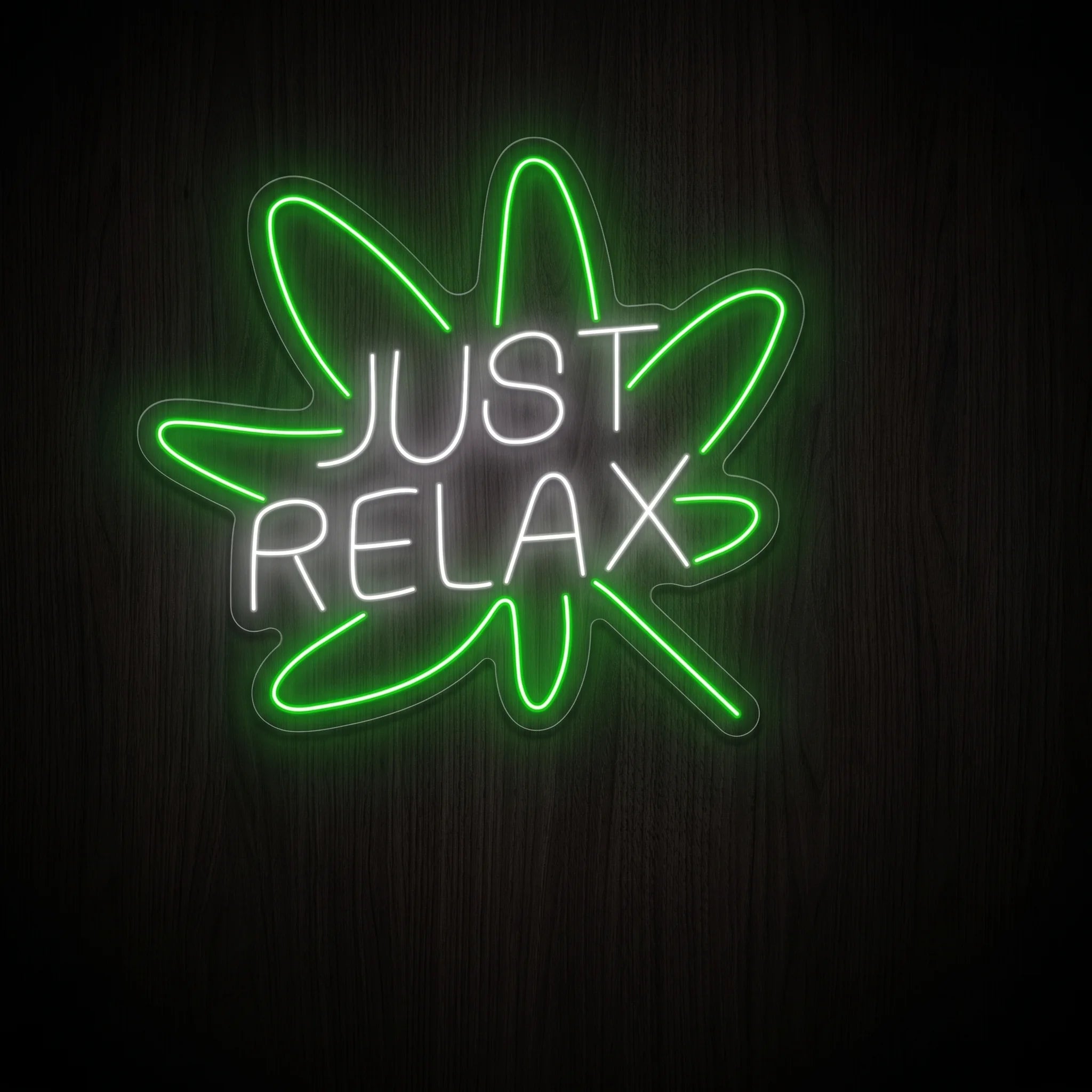 Just Relax Leaf LED neon sign featuring white JUST RELAX lettering inside a green cannabis leaf outline on clear acrylic backing for recreational wall dΓ©cor.