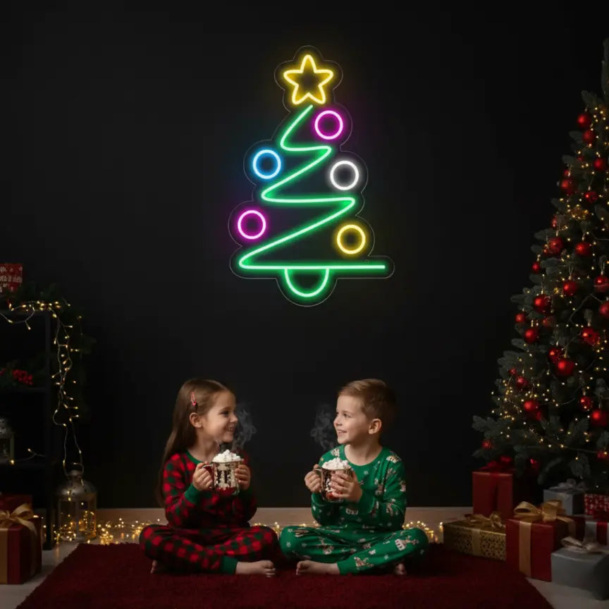 Photo of the 'Modern Christmas Tree' neon sign glowing in multicolor against a styled interior wall.