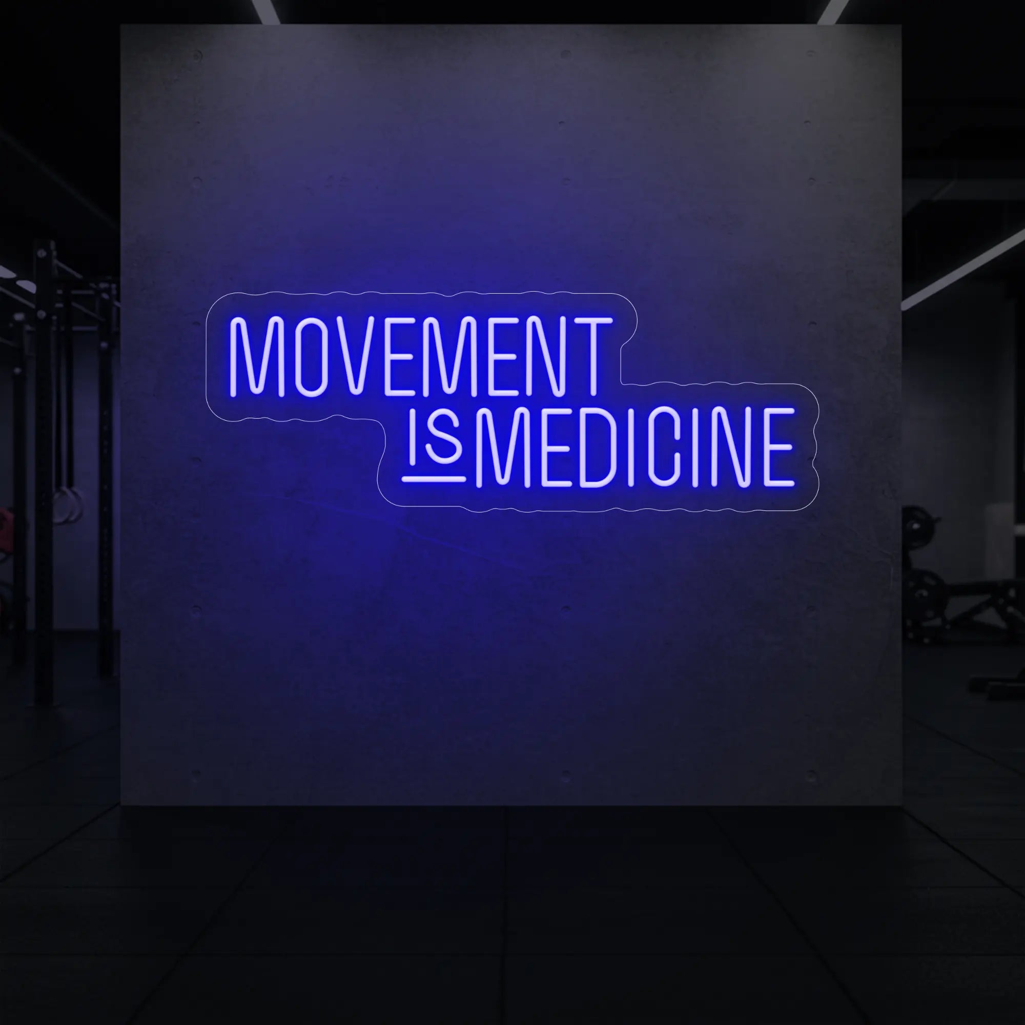 'Movement Is Medicine' neon sign glowing in deep blue against a styled interior wall.