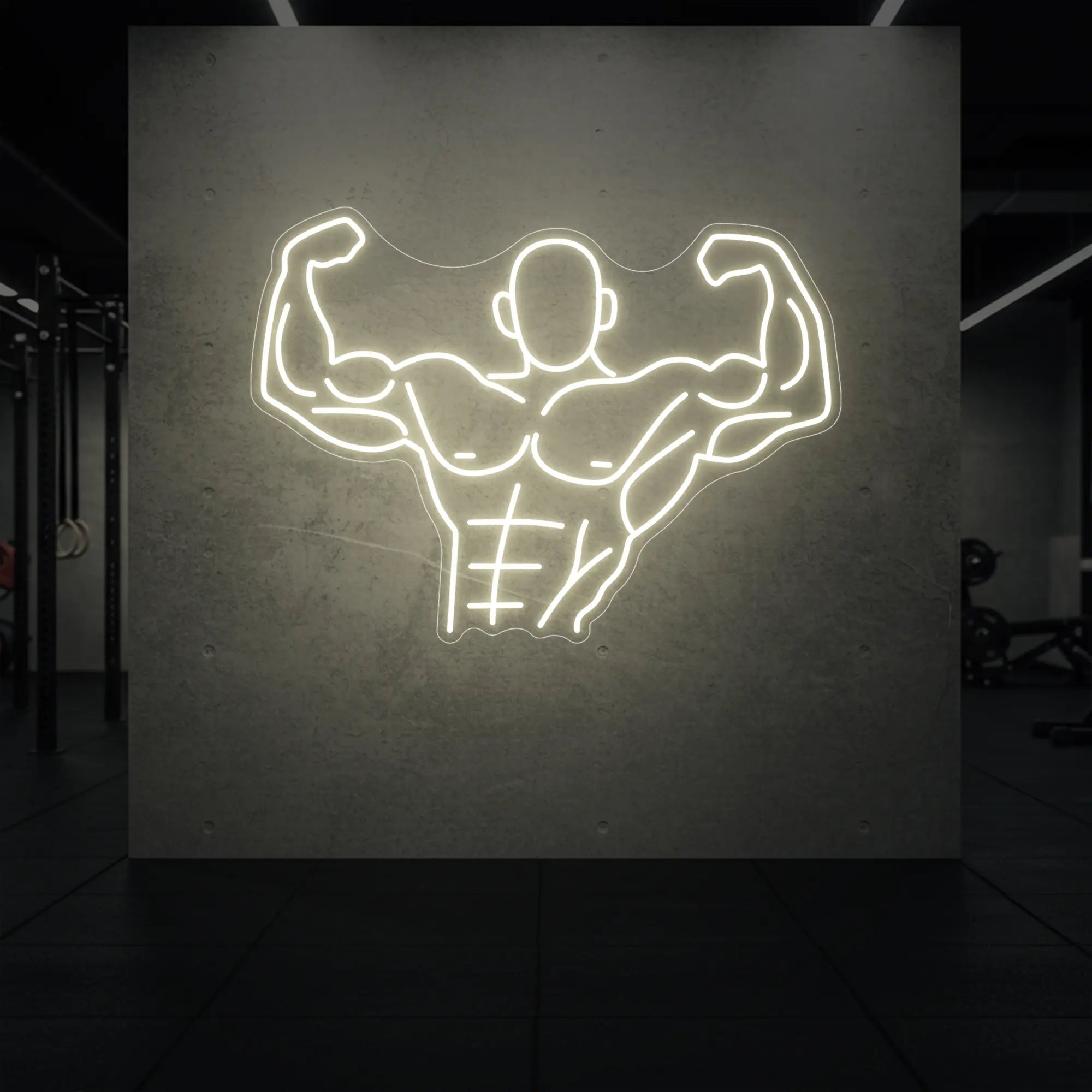 'Muscle Man (Torso-Up Flex)' neon sign glowing in warm white against a styled interior wall.