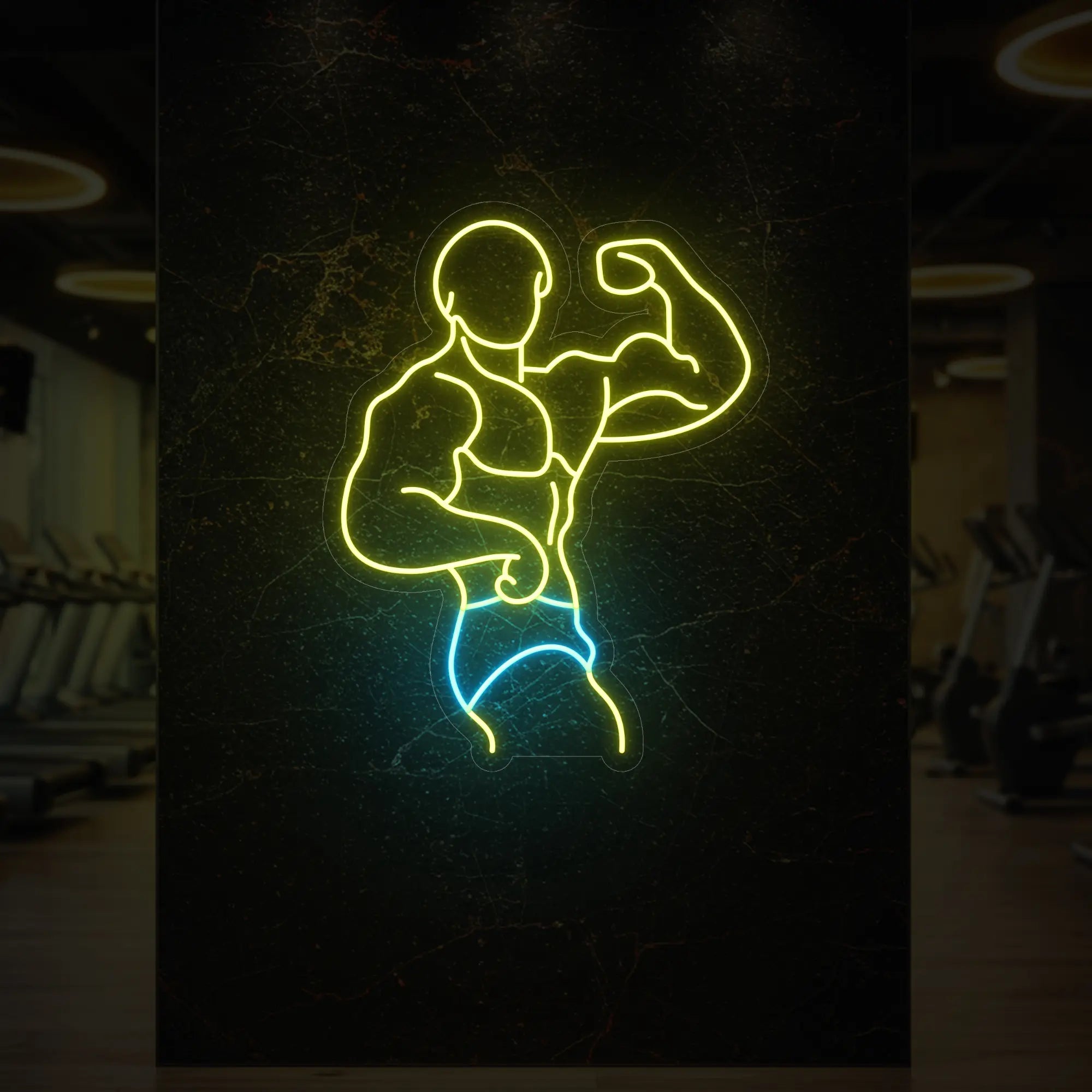 'Muscle Man Side Pose' in lemon yellow and ice blue neon against a styled interior wall.