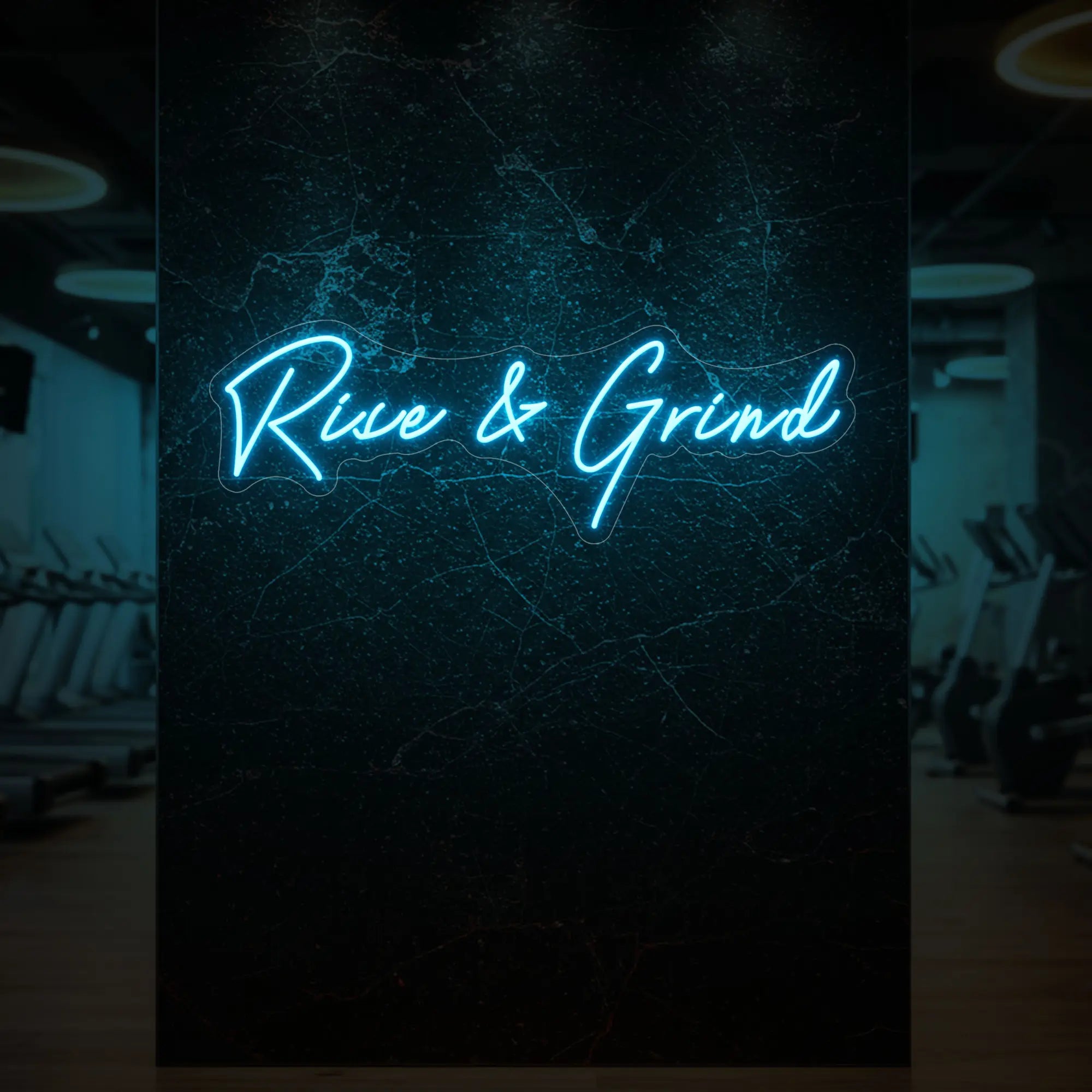 'Rise & Grind' neon sign glowing in ice blue against a styled interior wall