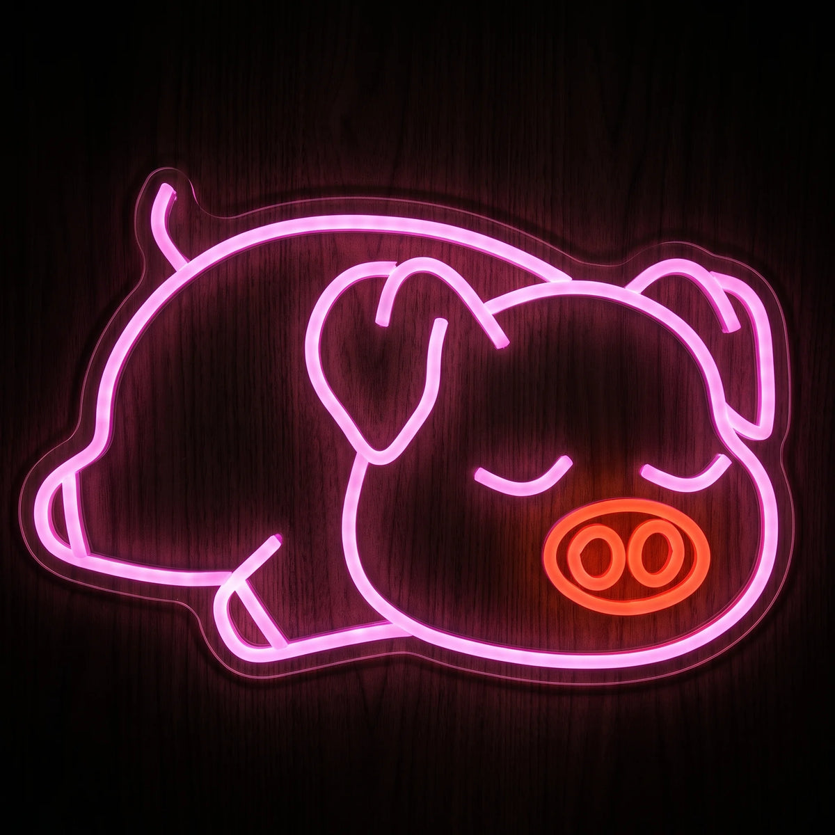 Sleeping Pig LED Neon Sign featuring a pink lounging pig with closed eyes and a glowing red-orange snout.