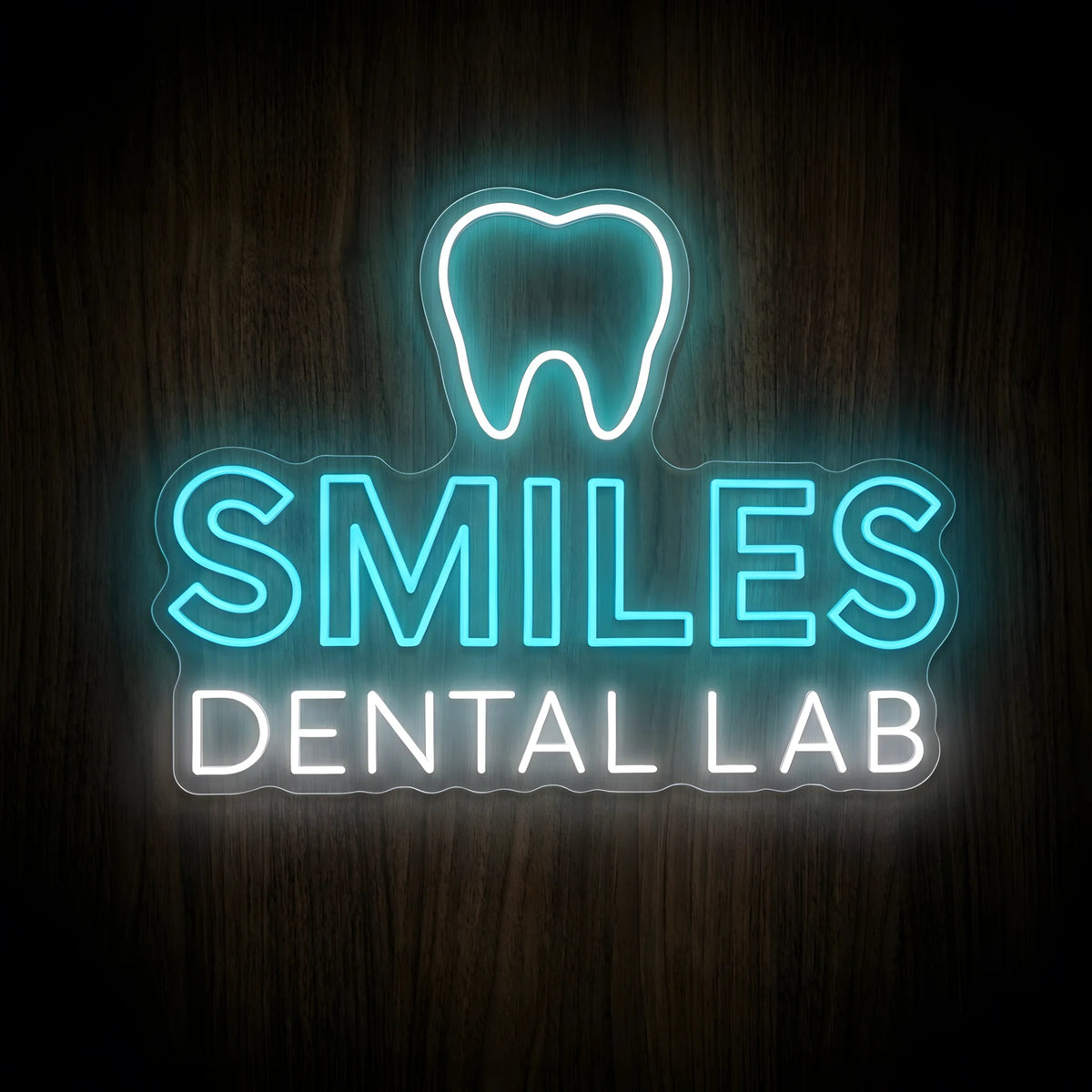 Smiles Dental Lab LED neon sign featuring a cool white tooth outline above cyan-blue SMILES lettering and white DENTAL LAB text on clear acrylic backing for dental laboratory wall decor.