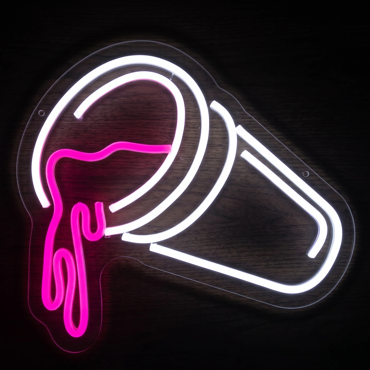 Spilled paint can LED neon sign with bright white can outline and vivid pink dripping paint on clear acrylic backing.