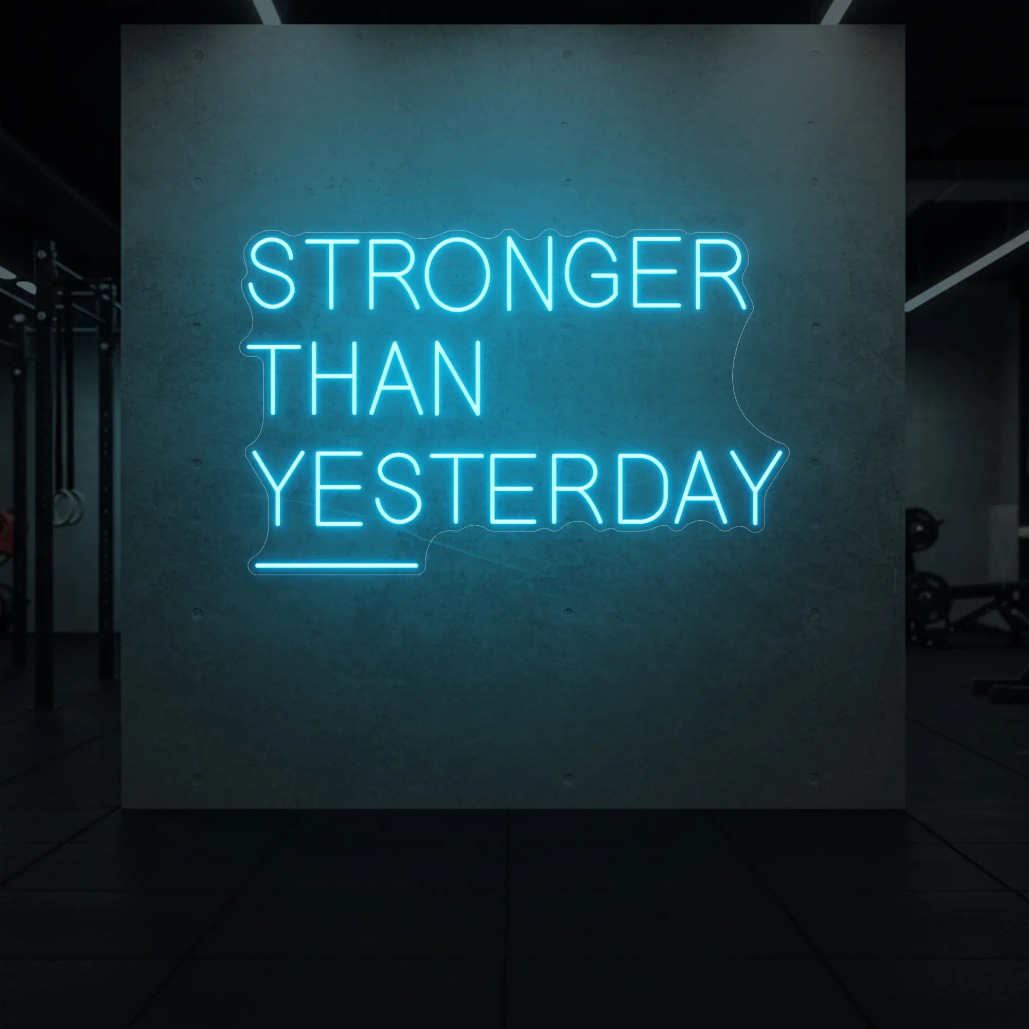 'Stronger Than Yesterday' neon sign glowing in ice blue against a styled interior wall.