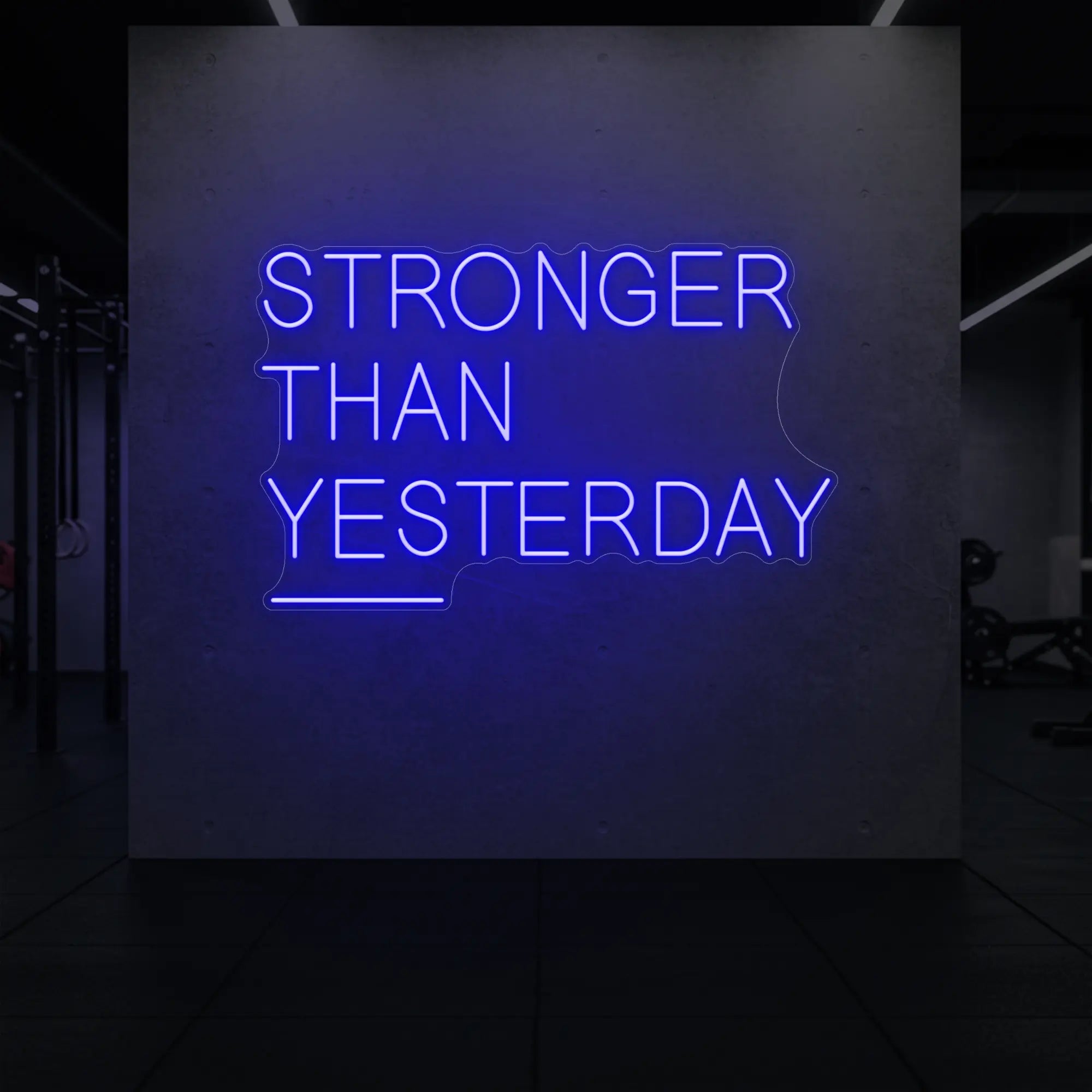 'Stronger Than Yesterday' neon sign glowing in deep blue against a styled interior wall.