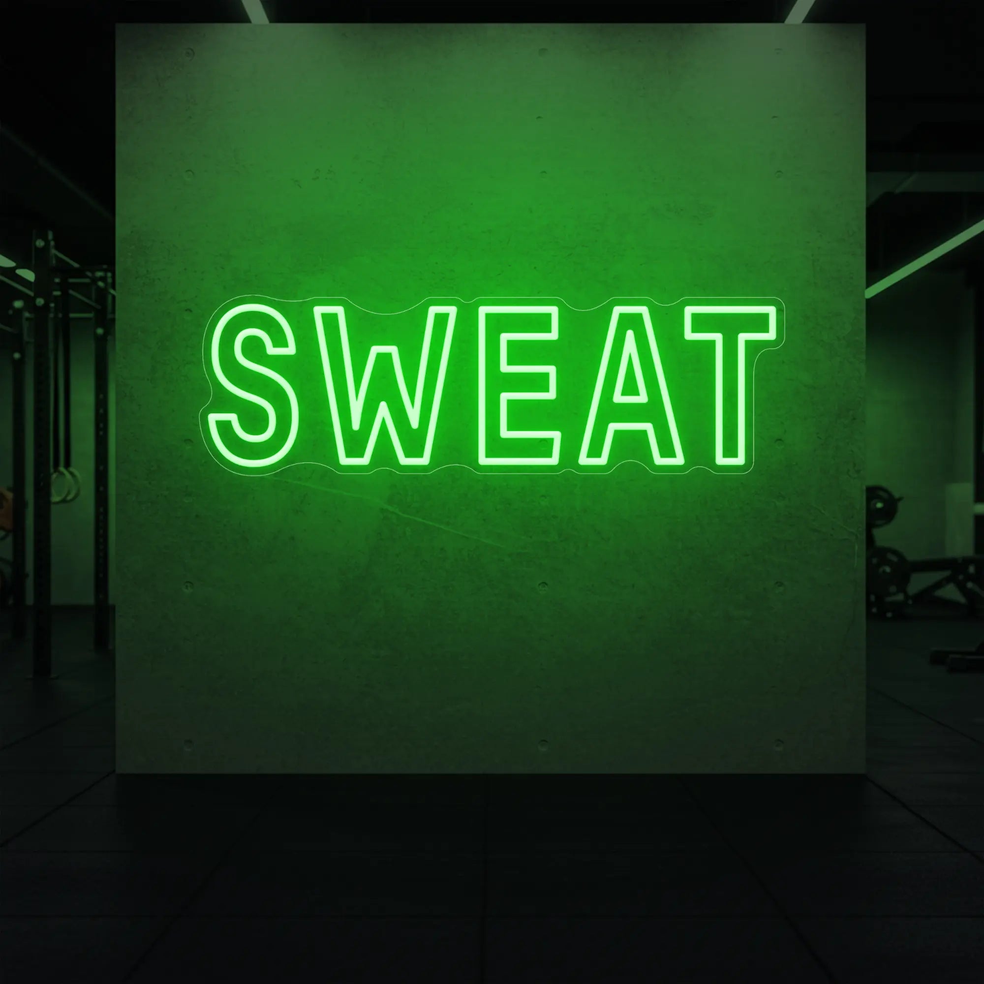 'SWEAT' neon sign glowing in green against a styled interior wall.