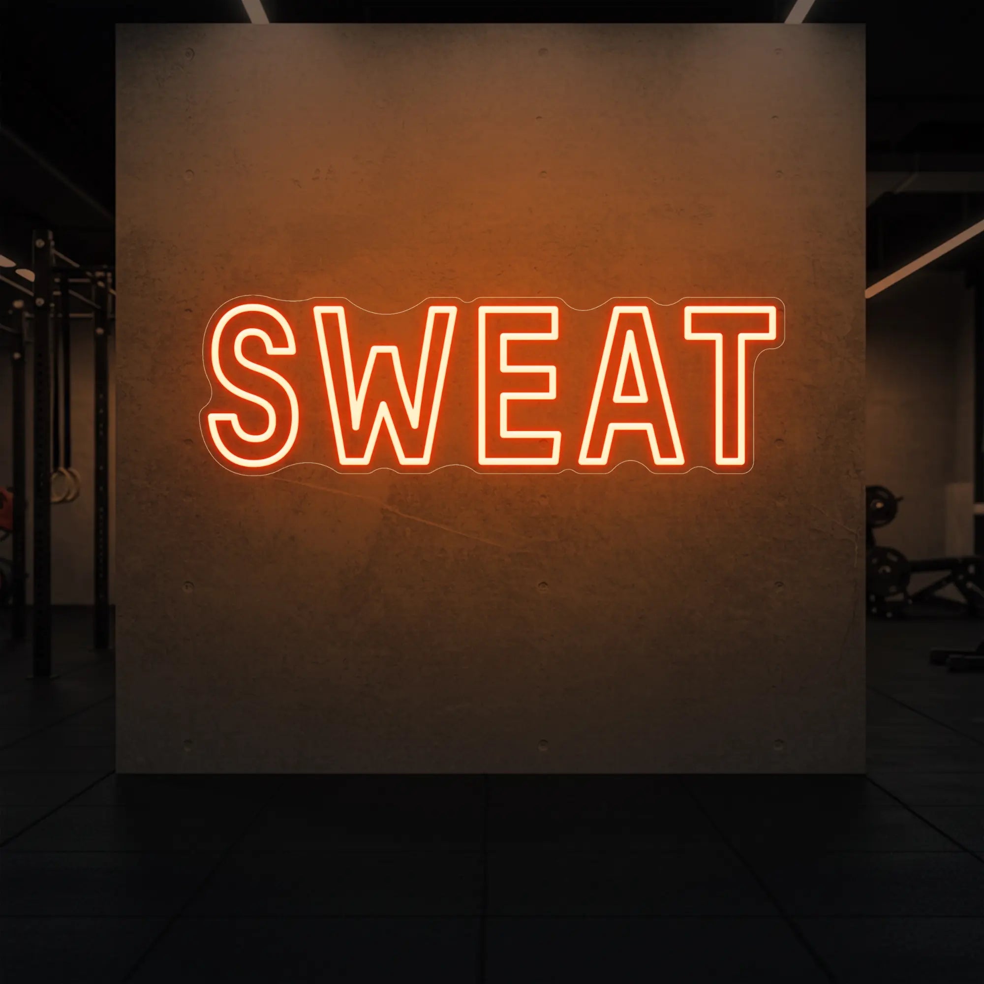 'SWEAT' neon sign glowing in golden yellow against a styled interior wall.