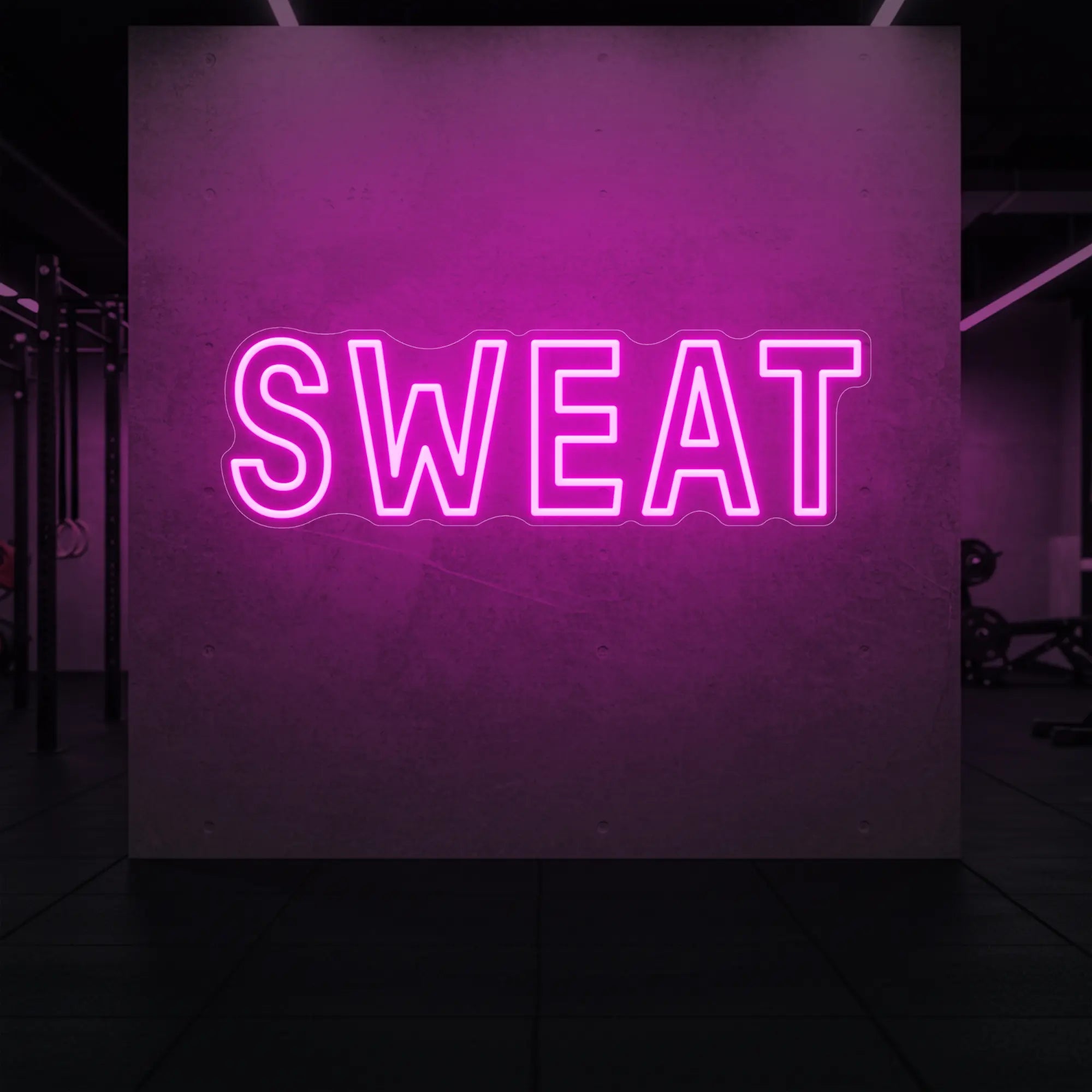 'SWEAT' neon sign glowing in light pink against a styled interior wall.