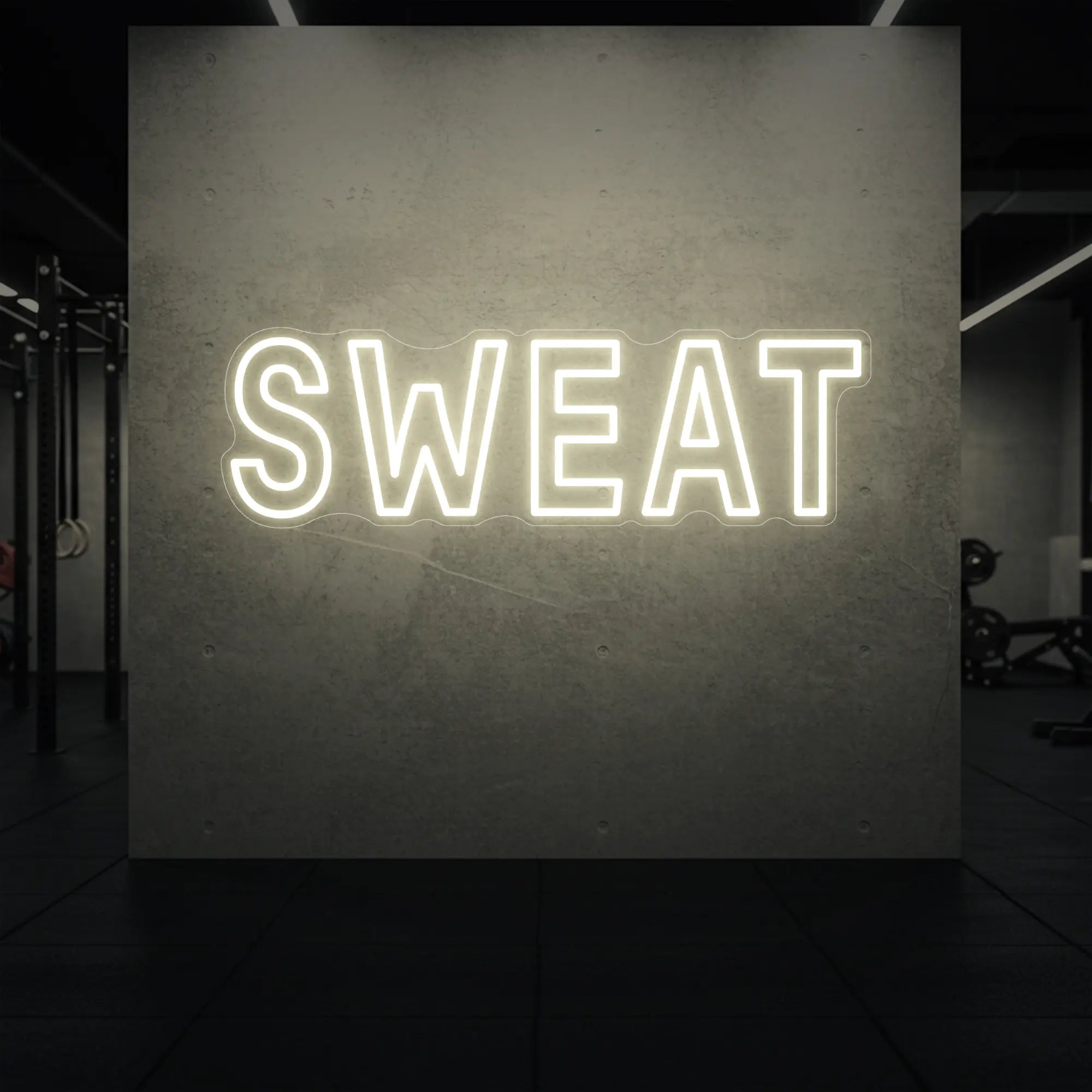'SWEAT' neon sign glowing in warm white against a styled interior wall.