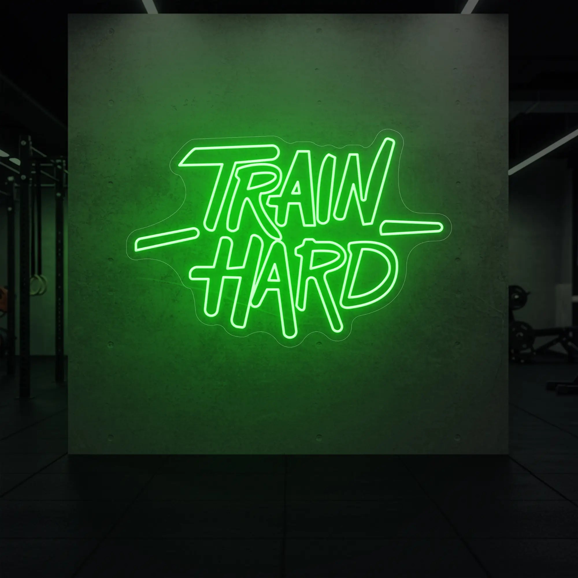 'TRAIN HARD' neon sign glowing in green against a styled interior wall.