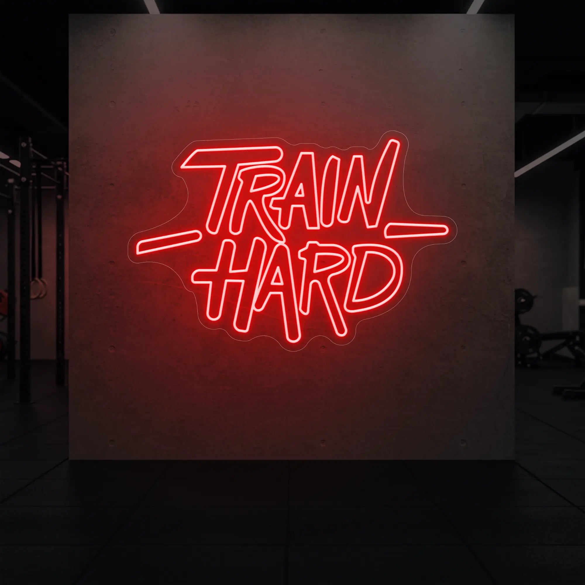 'TRAIN HARD' neon sign glowing in red against a styled interior wall.
