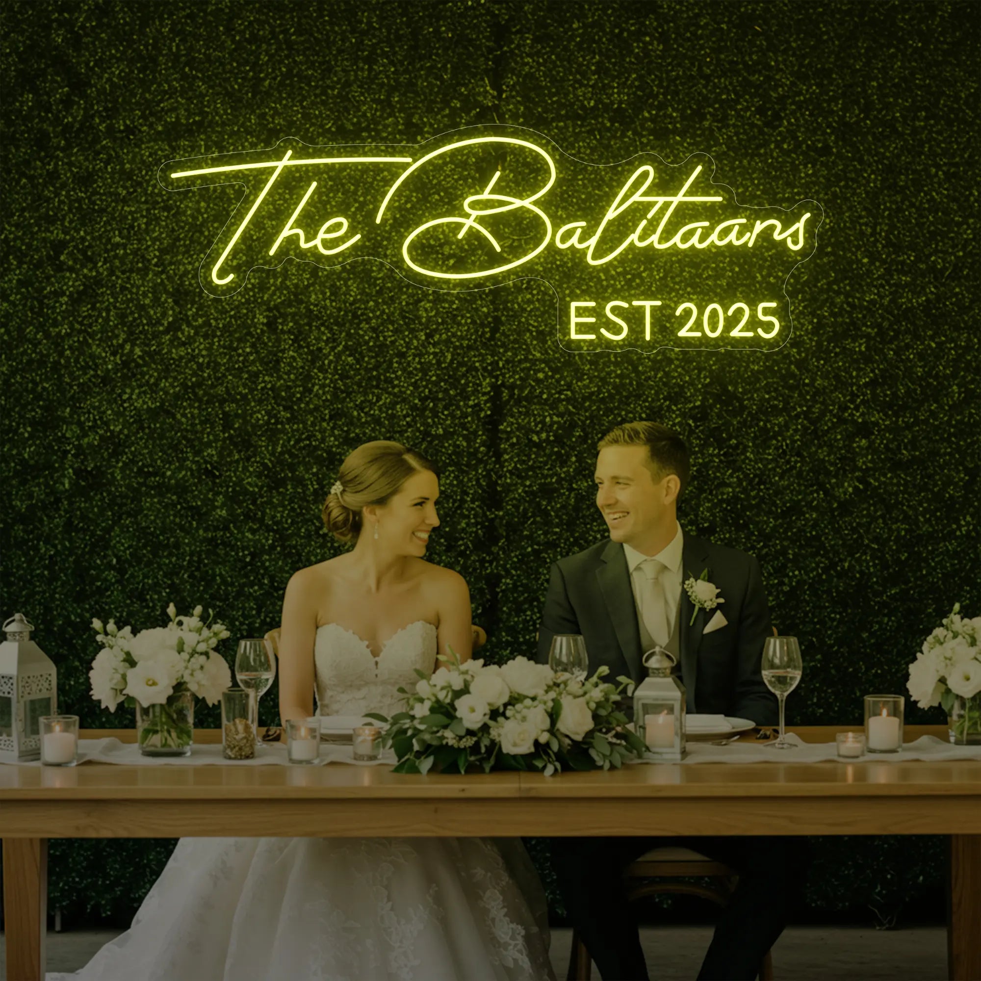 Photo of the 'Wedding Last Names Custom Neon Sign V1' neon sign glowing in lemon yellow against a styled interior wall.