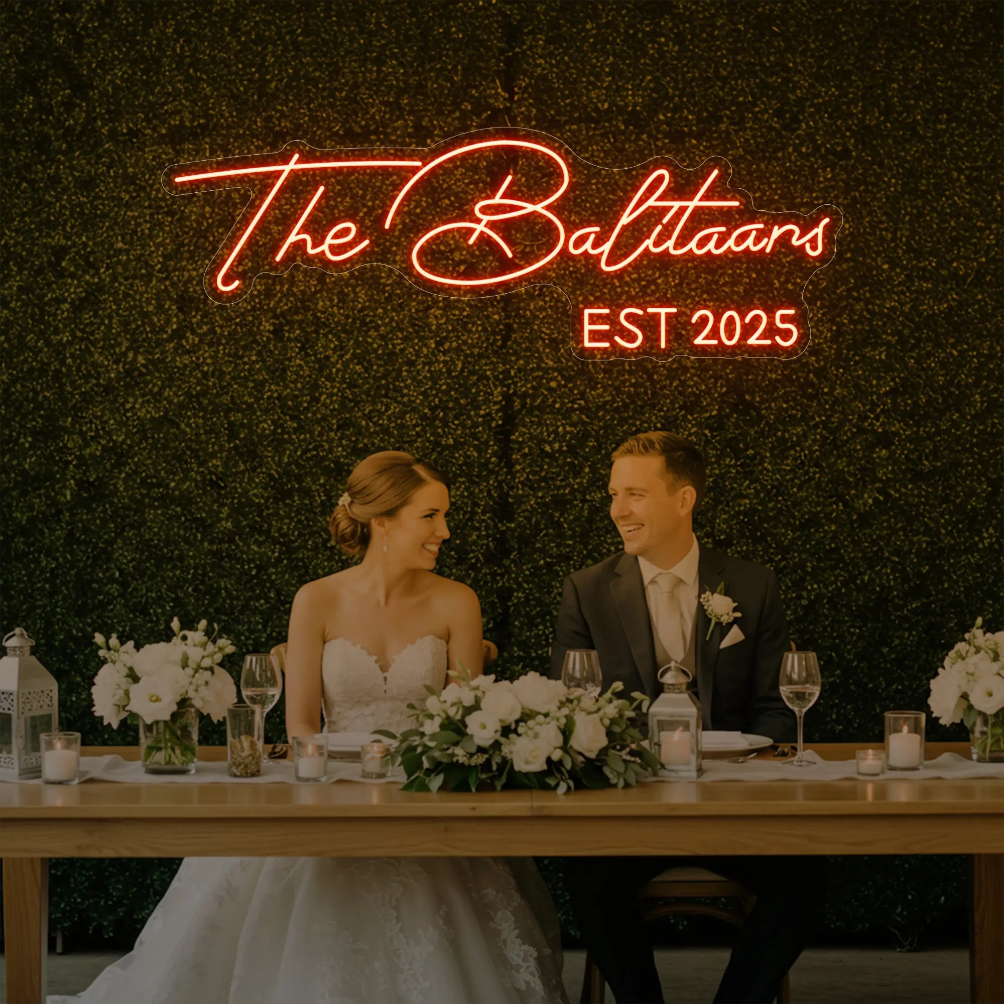 Photo of the 'Wedding Last Names Custom Neon Sign V1' neon sign glowing in golden yellow against a styled interior wall.