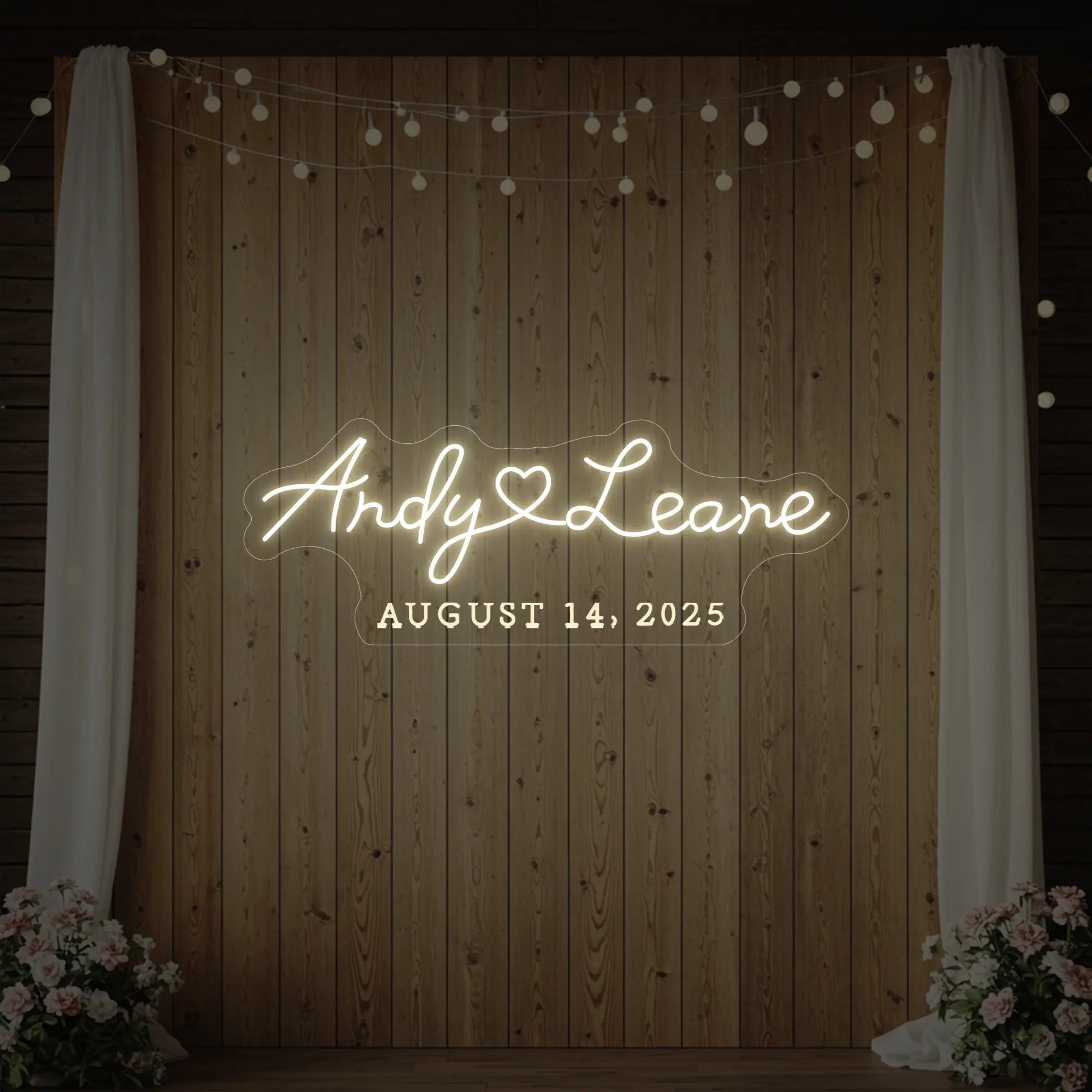 Photo of the 'Wedding First Names Custom Neon Sign' neon sign glowing in warm white against a styled interior wall.
