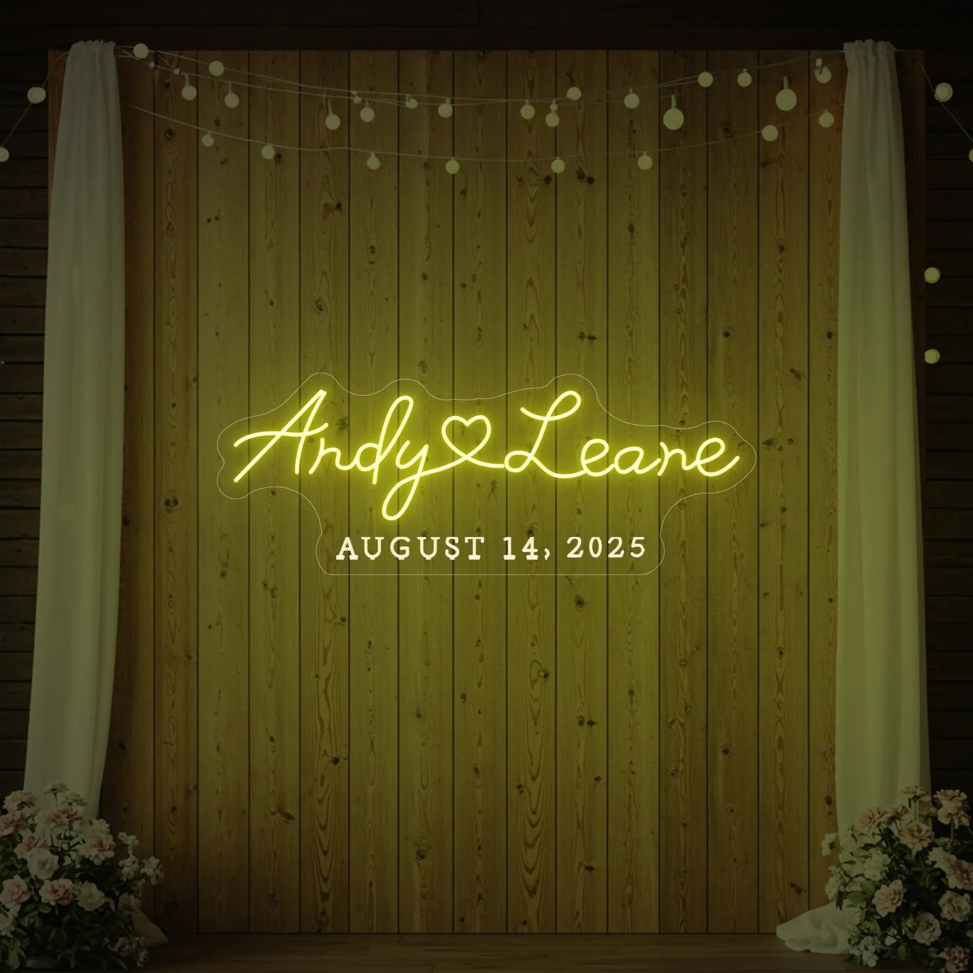 Photo of the 'Wedding First Names Custom Neon Sign' neon sign glowing in lemon yellow against a styled interior wall.