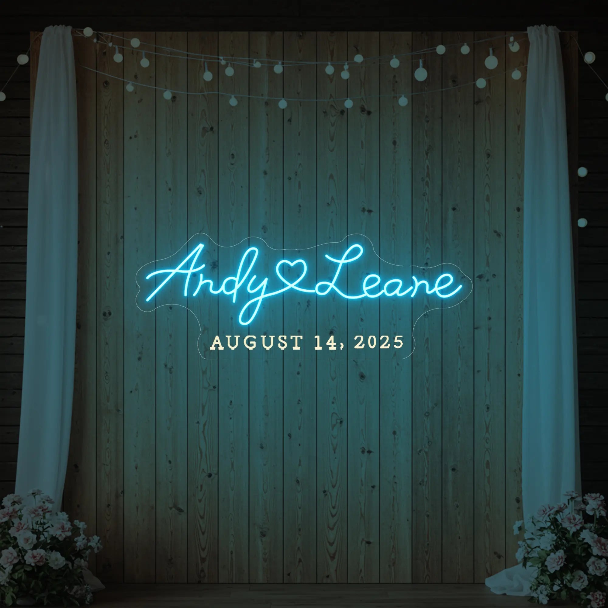 Photo of the 'Wedding First Names Custom Neon Sign' neon sign glowing in ice blue against a styled interior wall.