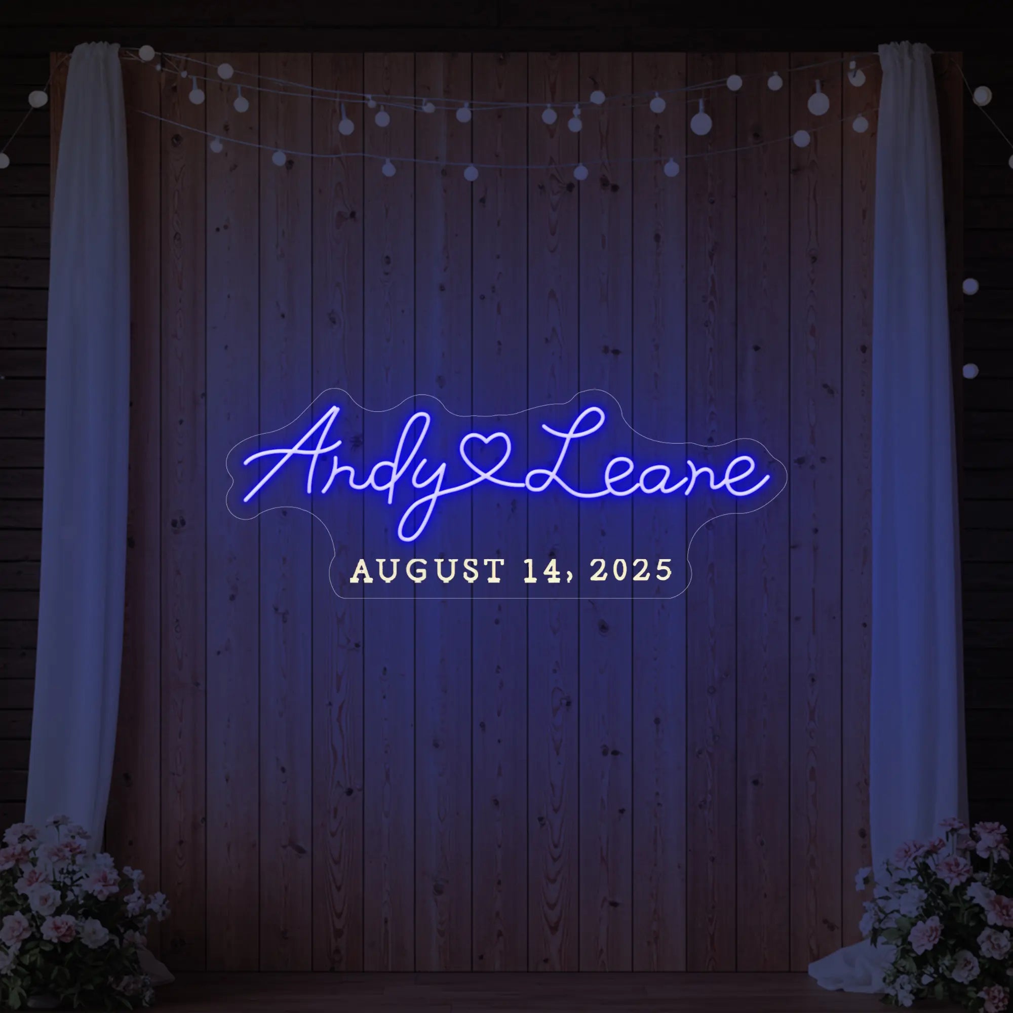 Photo of the 'Wedding First Names Custom Neon Sign' neon sign glowing in deep blue against a styled interior wall.