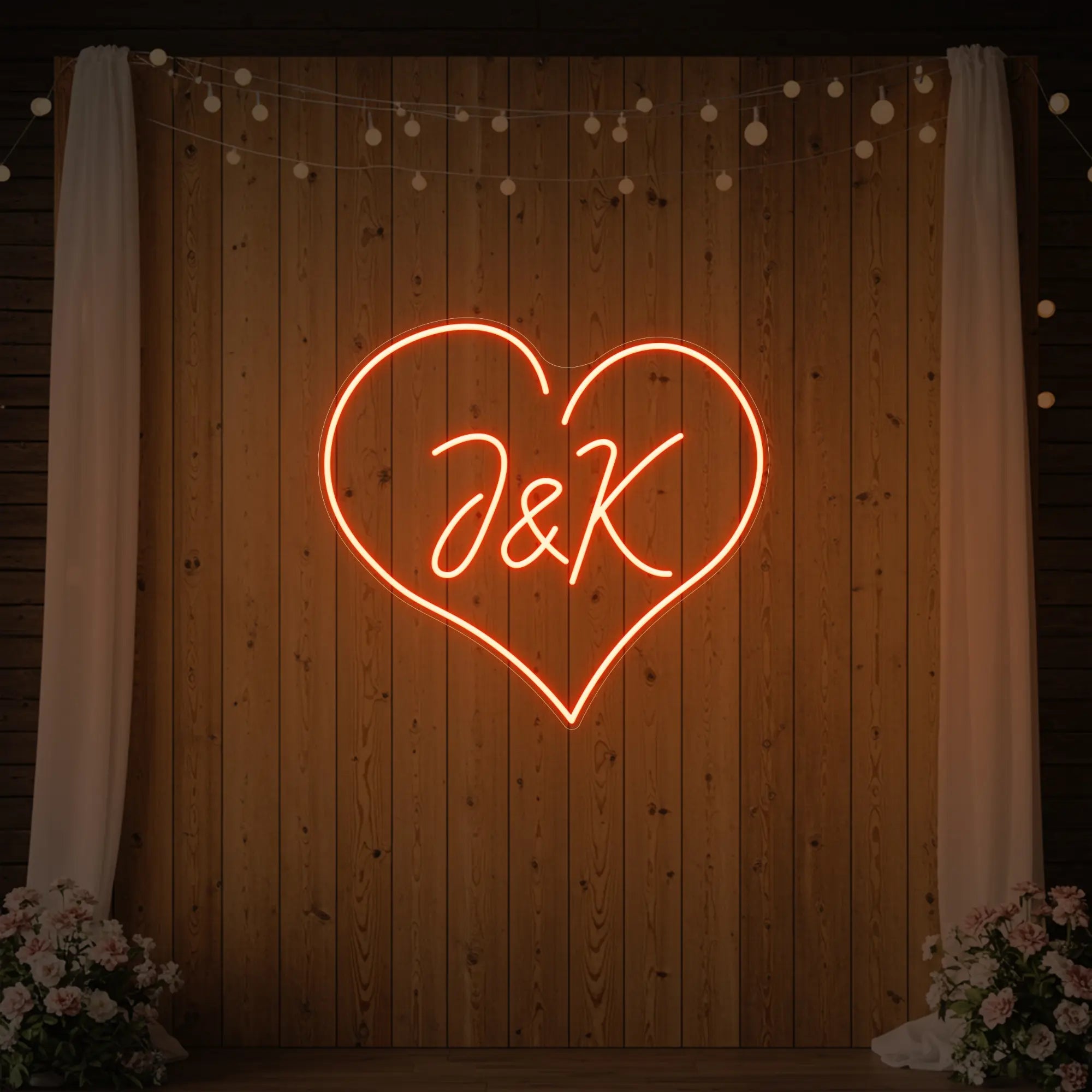 Photo of the 'Wedding Initials Custom Neon Sign V5' neon sign glowing in golden yellow against a styled interior wall.