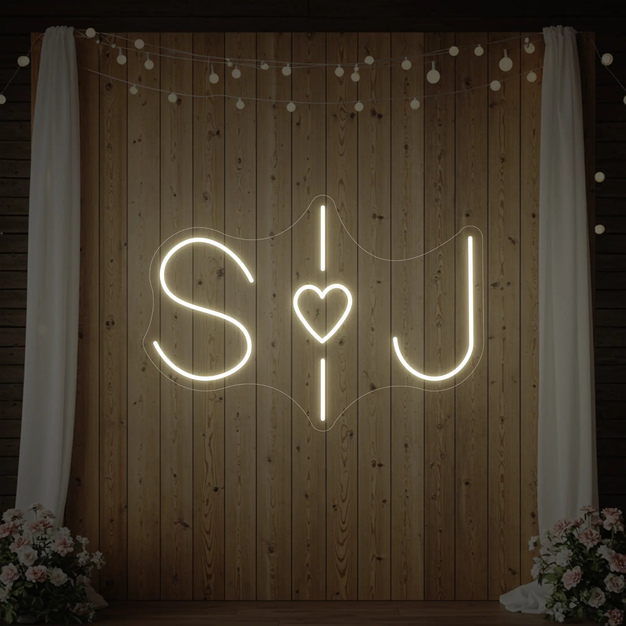 Photo of the 'Wedding Initials Custom Neon Sign V6' neon sign glowing in warm white against a styled interior wall.