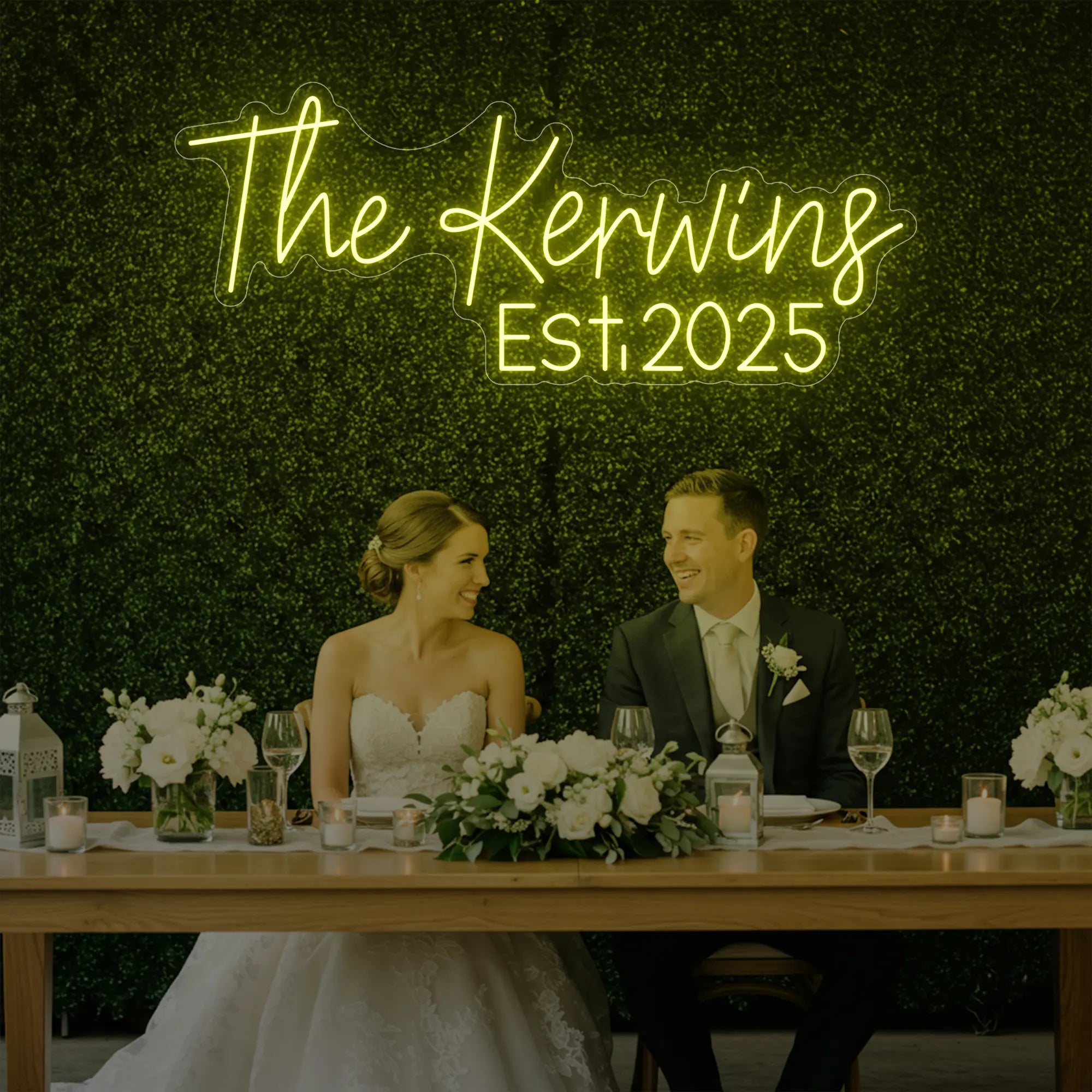 Photo of the 'Wedding Last Names Custom Neon Sign V5' neon sign glowing in lemon yellow against a styled interior wall.