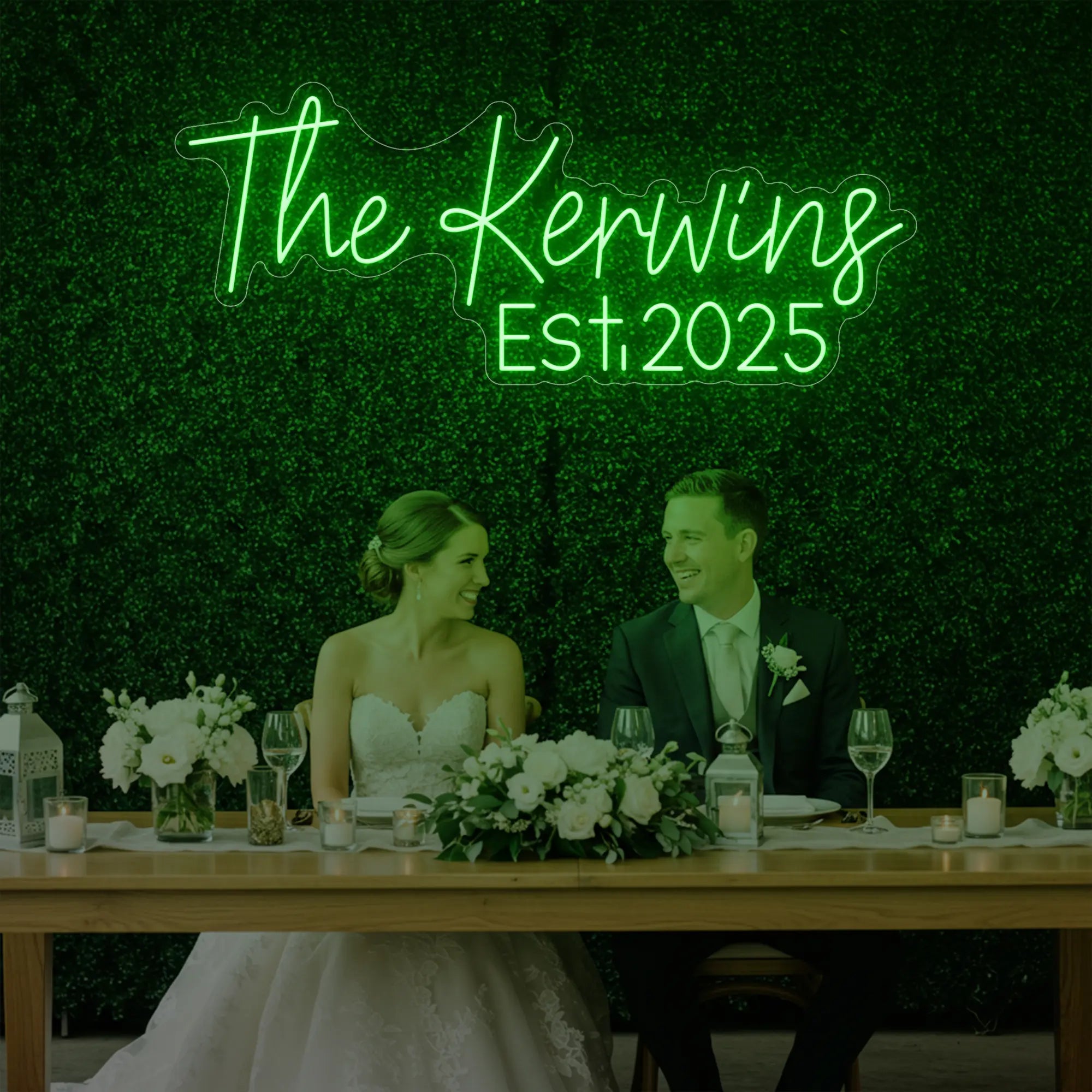 Photo of the 'Wedding Last Names Custom Neon Sign V5' neon sign glowing in green against a styled interior wall.