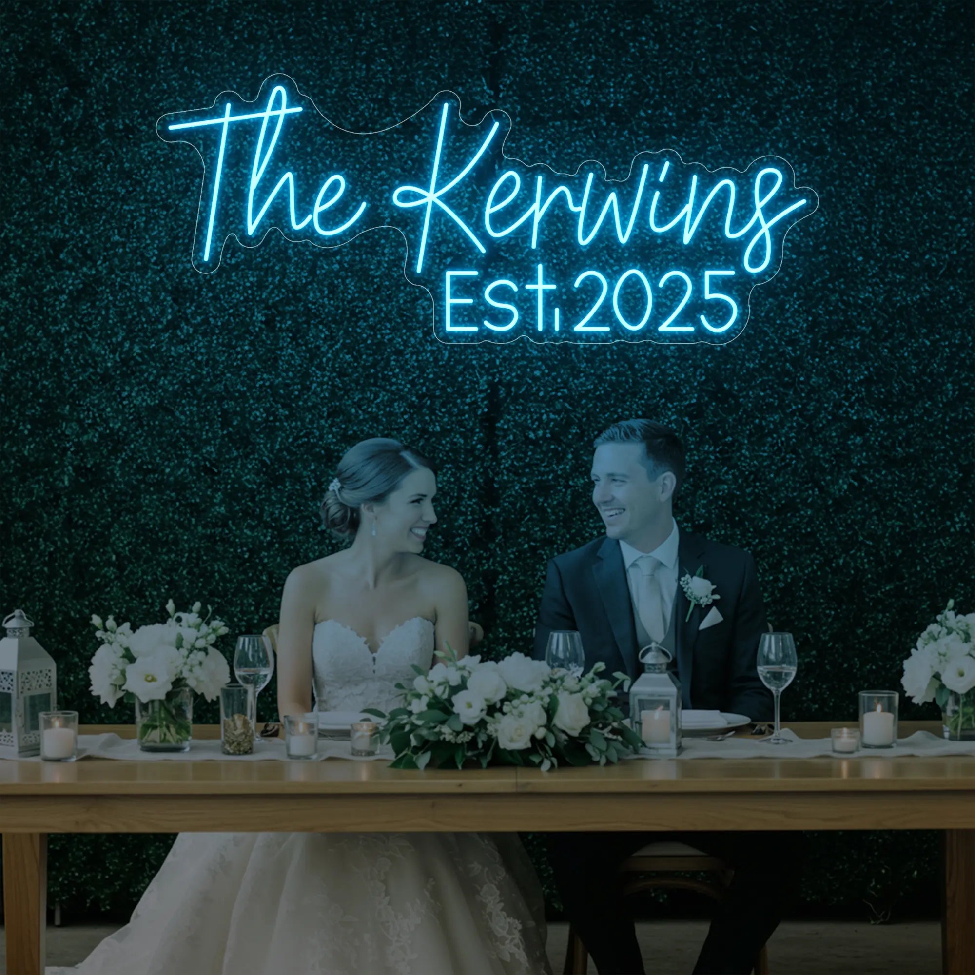 Photo of the 'Wedding Last Names Custom Neon Sign V5' neon sign glowing in ice blue against a styled interior wall.