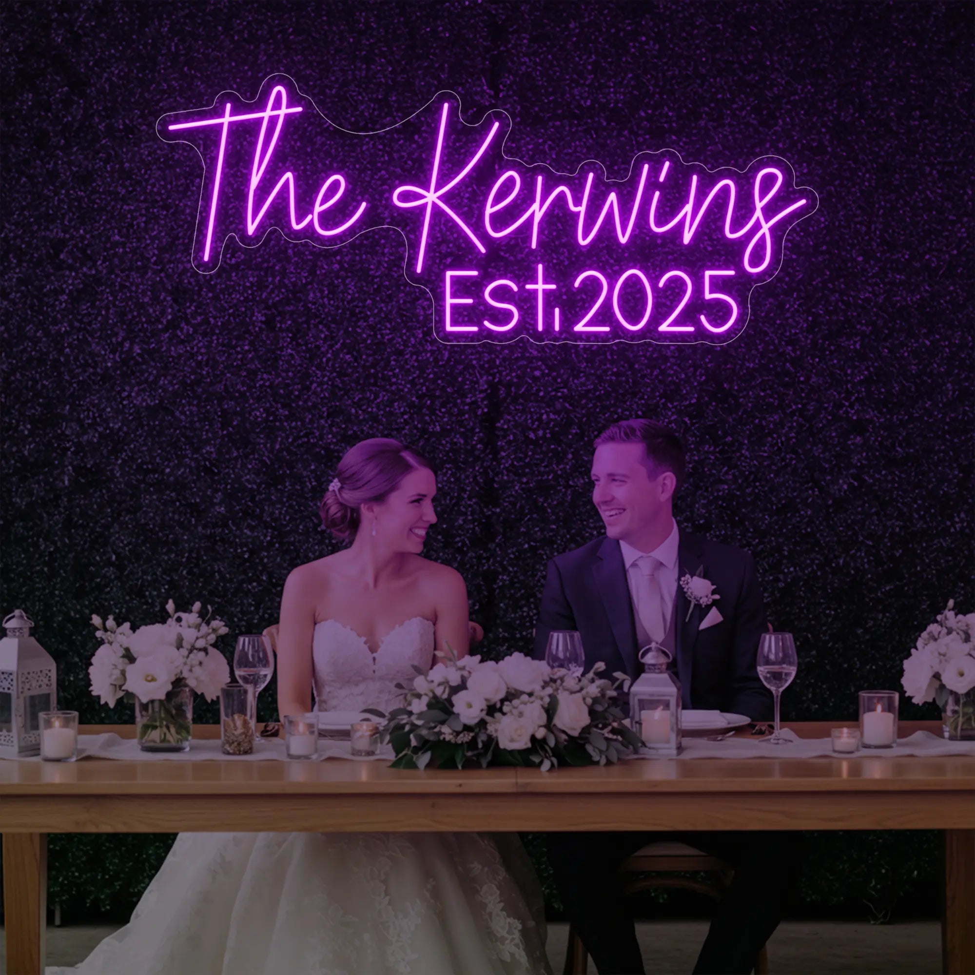 Photo of the 'Wedding Last Names Custom Neon Sign V5' neon sign glowing in deep pink against a styled interior wall.