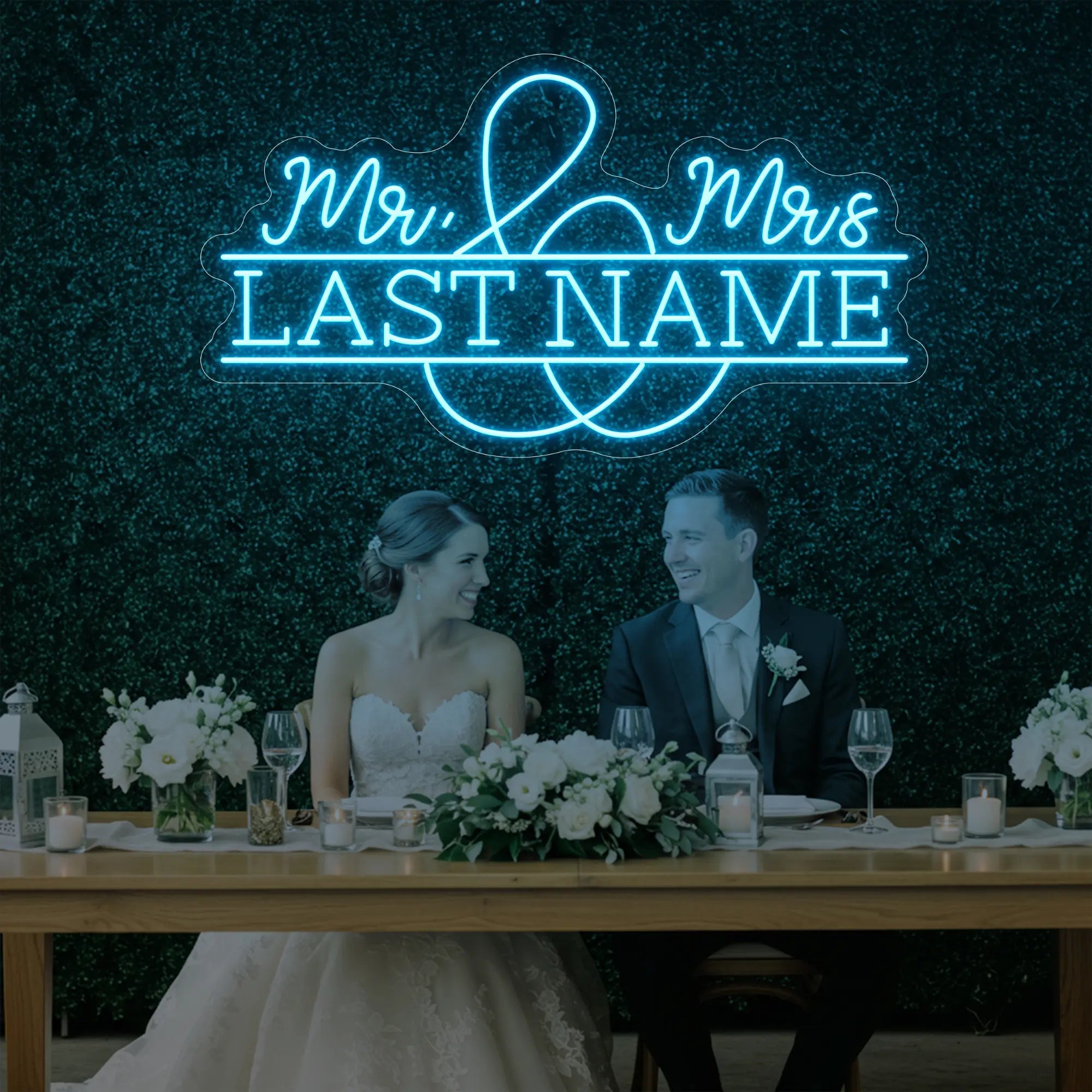 Photo of the 'Wedding Last Names Custom Neon Sign V6' neon sign glowing in ice blue against a styled interior wall.