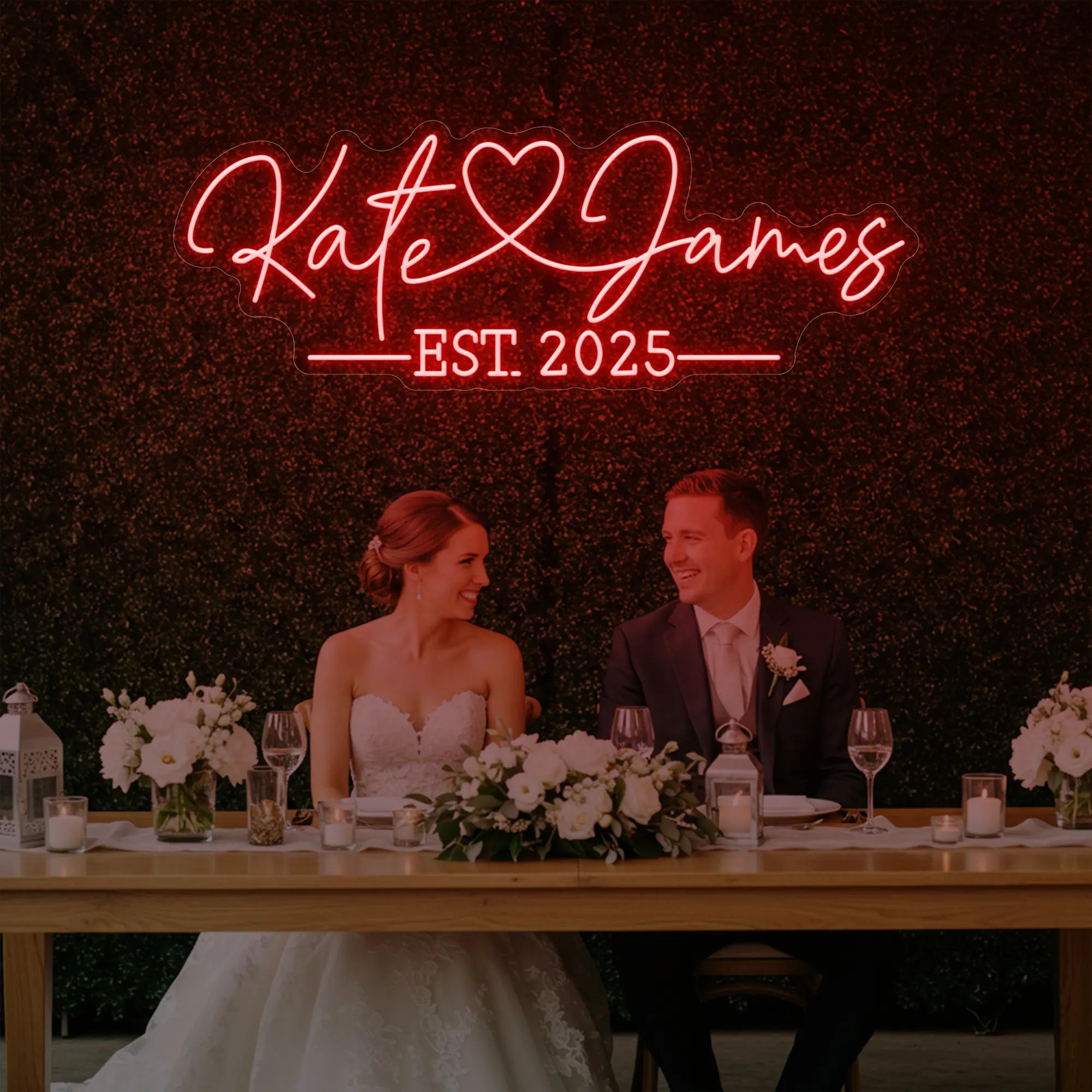 Photo of the 'Wedding Names Custom Neon Sign' neon sign glowing in red against a styled interior wall.