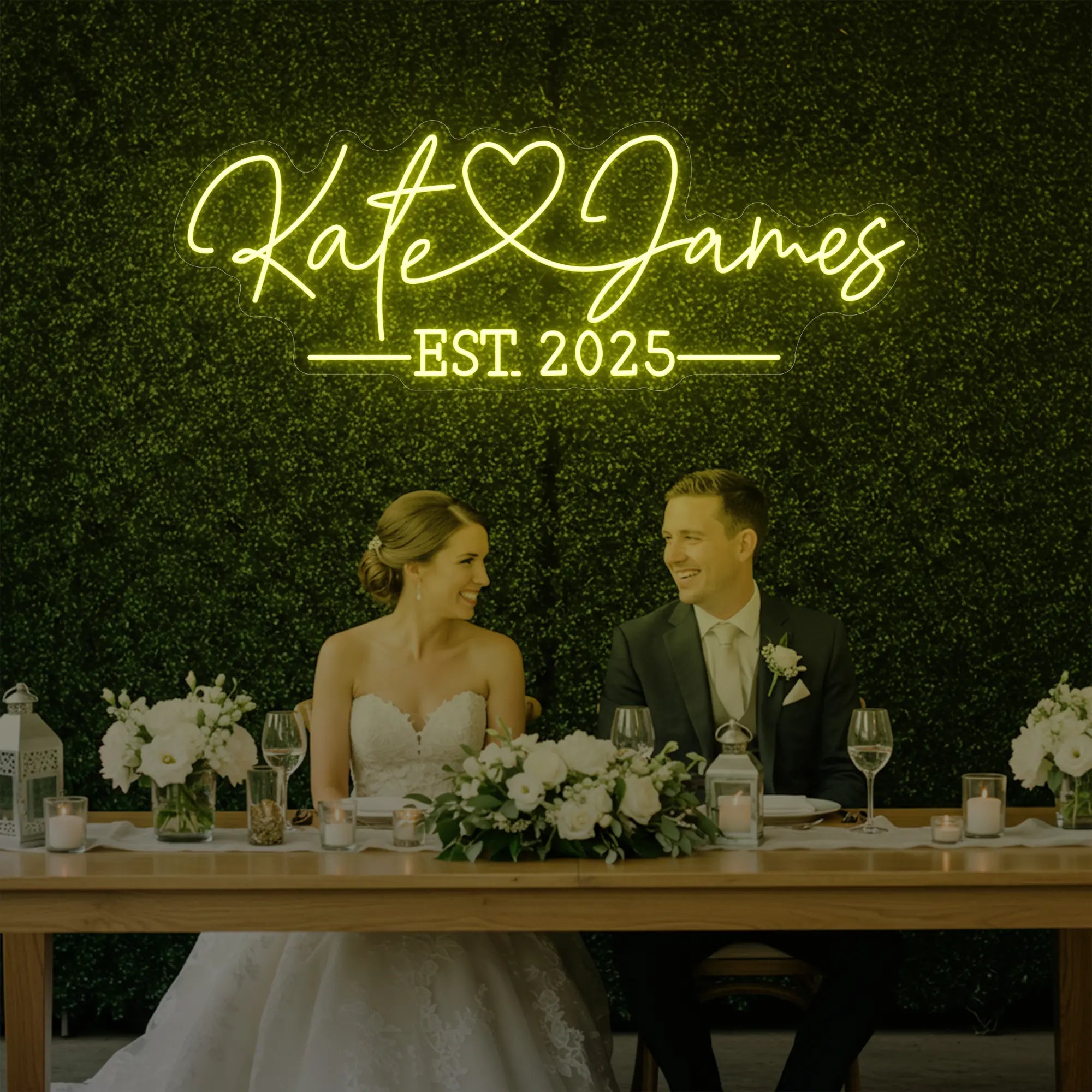Photo of the 'Wedding Names Custom Neon Sign' neon sign glowing in lemon yellow against a styled interior wall.
