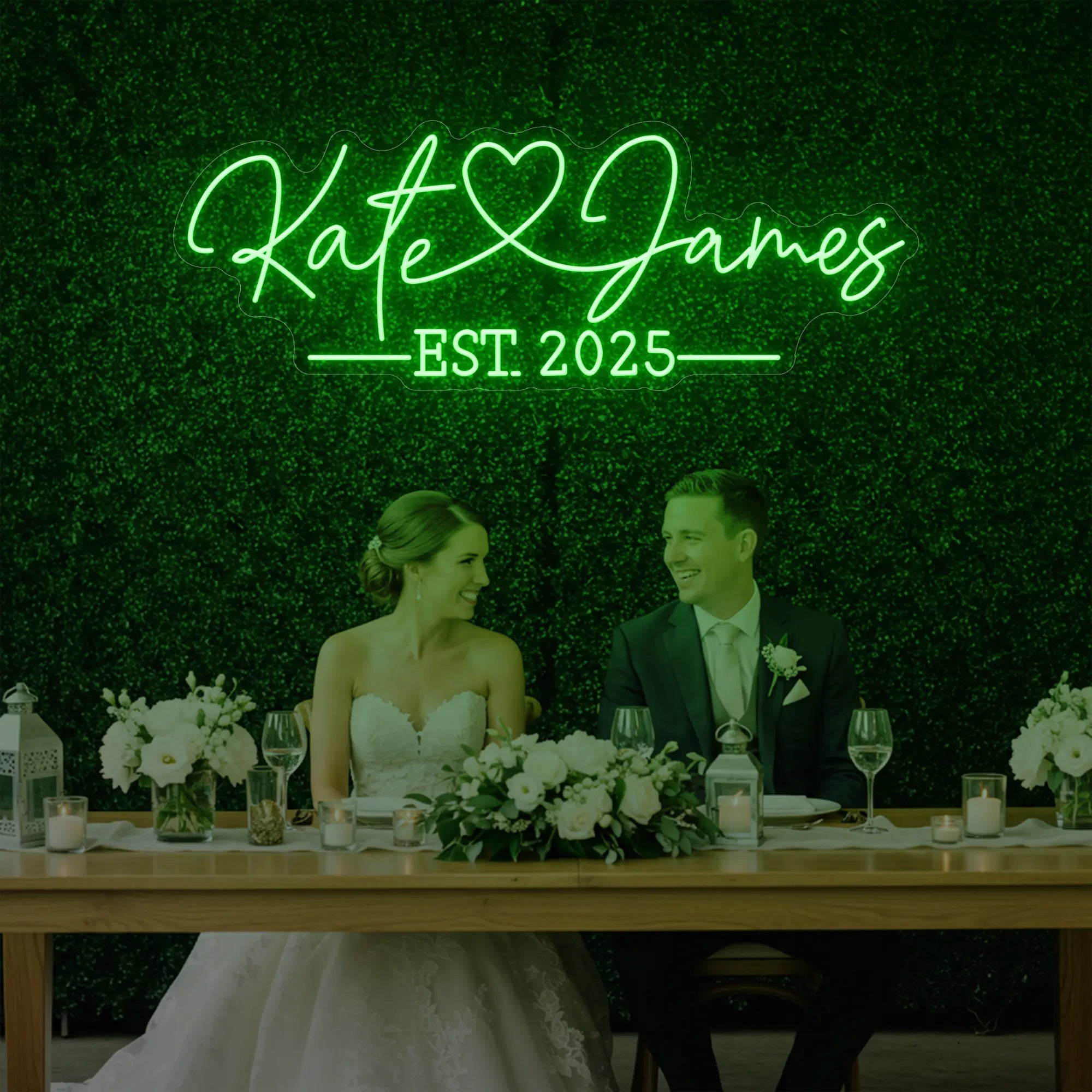 Photo of the 'Wedding Names Custom Neon Sign' neon sign glowing in green against a styled interior wall.