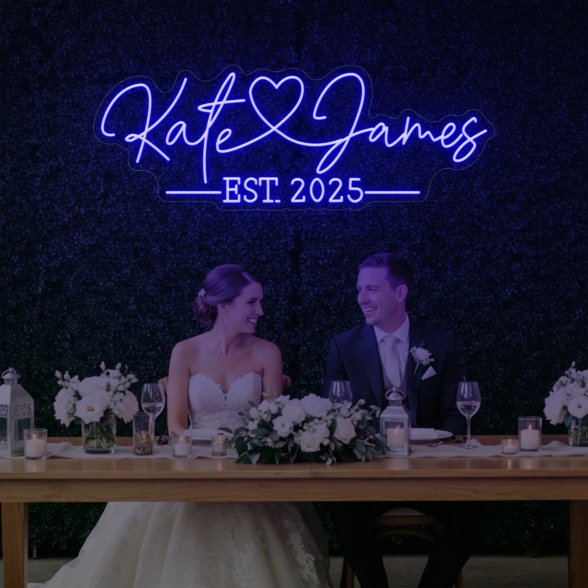 Photo of the 'Wedding Names Custom Neon Sign' neon sign glowing in deep blue against a styled interior wall.